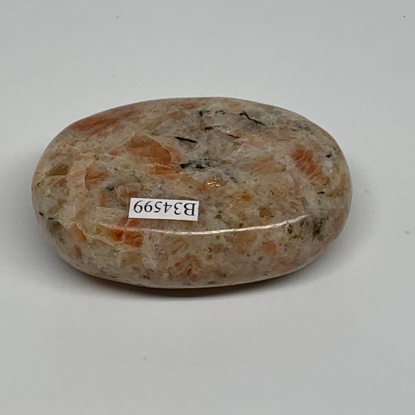 128.5g, 2.7"x1.9"x0.9", Natural Sunstone Palm-Stone Polished from India, B34599