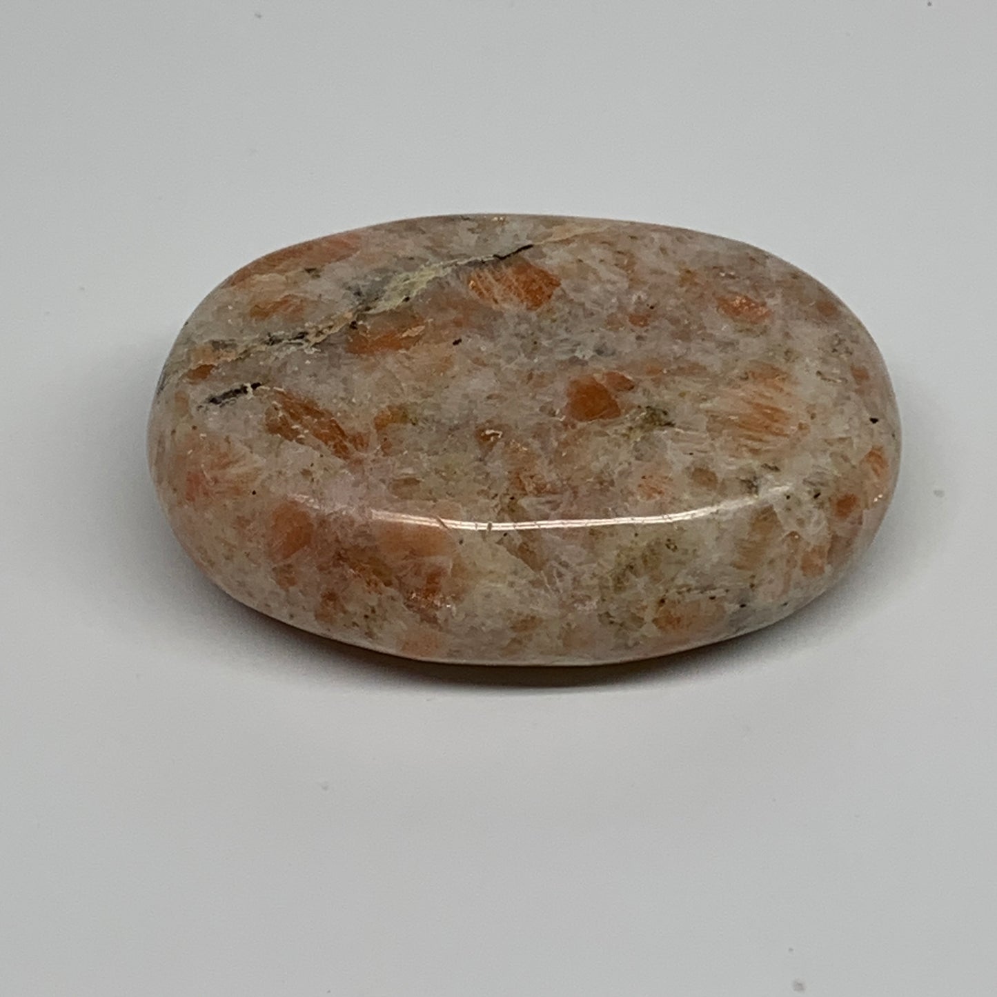 128.5g, 2.7"x1.9"x0.9", Natural Sunstone Palm-Stone Polished from India, B34599