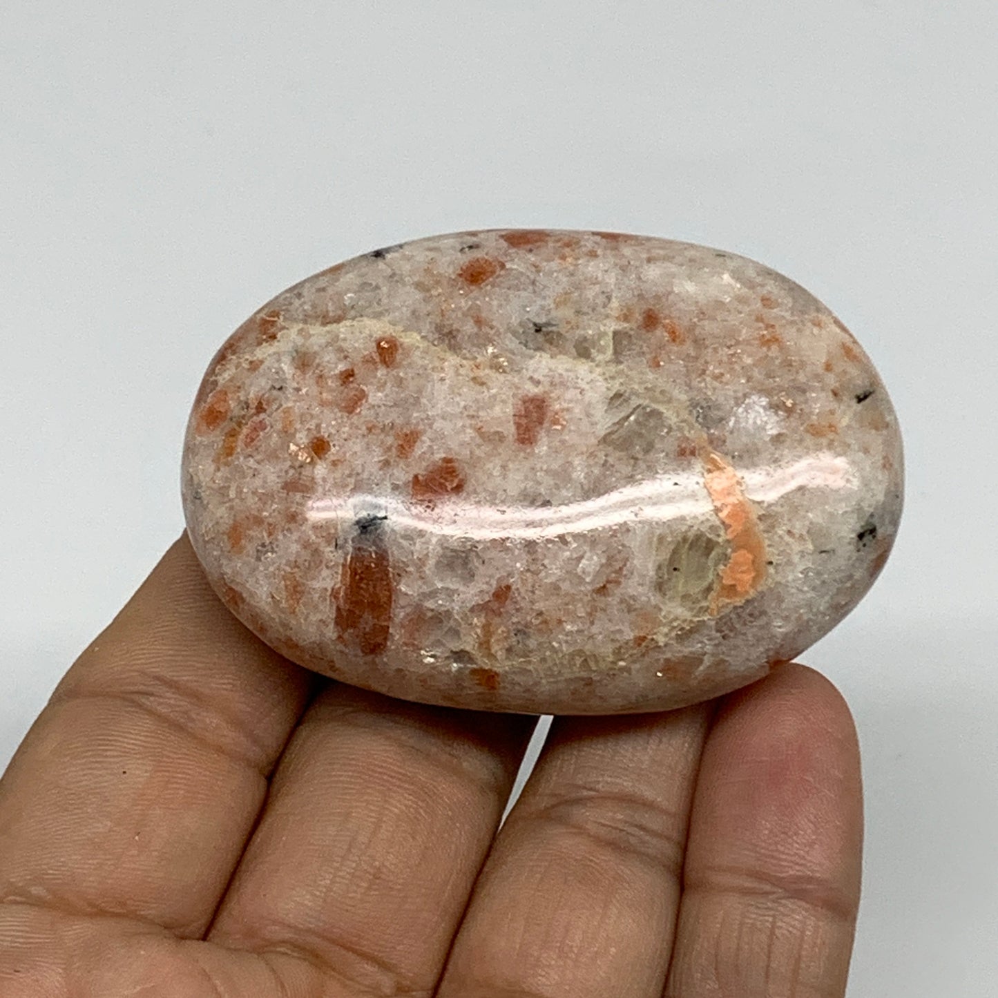 85.9g, 2.4"x1.7"x0.8", Natural Sunstone Palm-Stone Polished from India, B34603