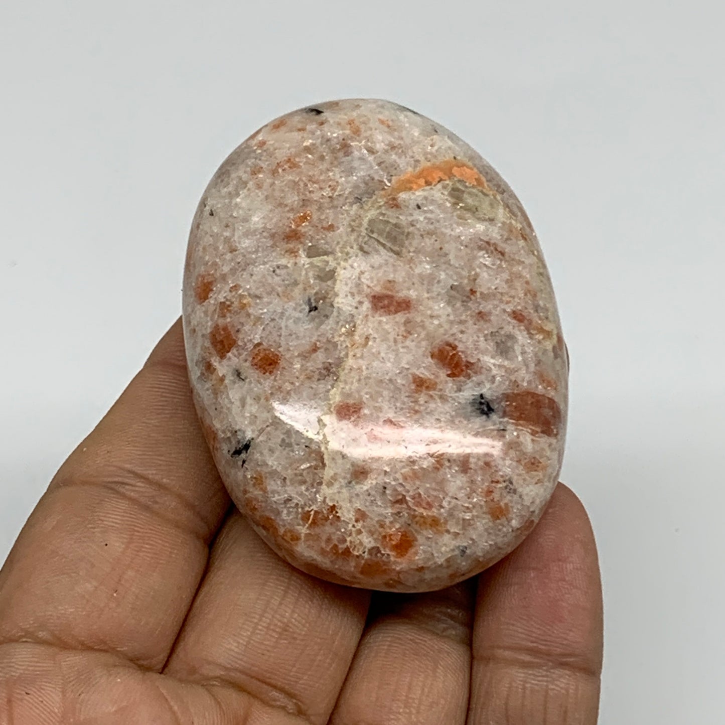 85.9g, 2.4"x1.7"x0.8", Natural Sunstone Palm-Stone Polished from India, B34603