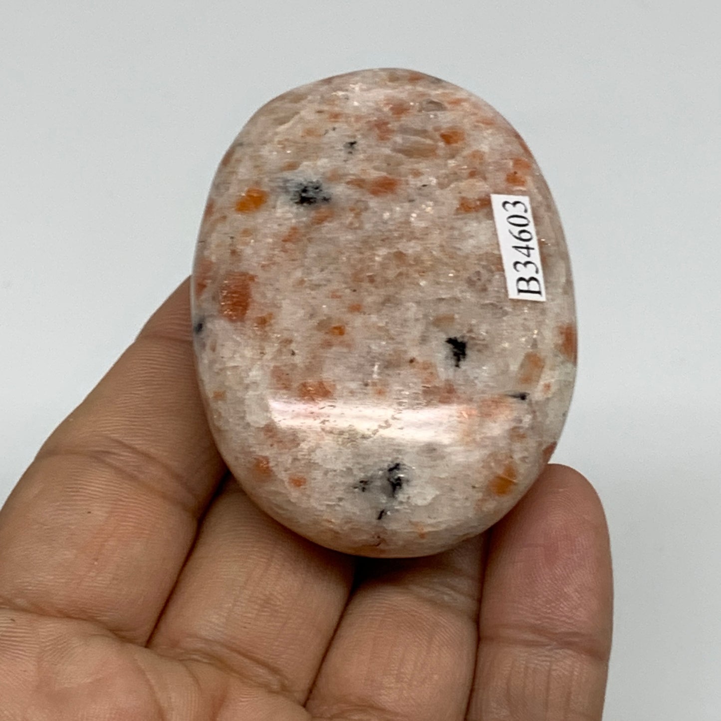 85.9g, 2.4"x1.7"x0.8", Natural Sunstone Palm-Stone Polished from India, B34603