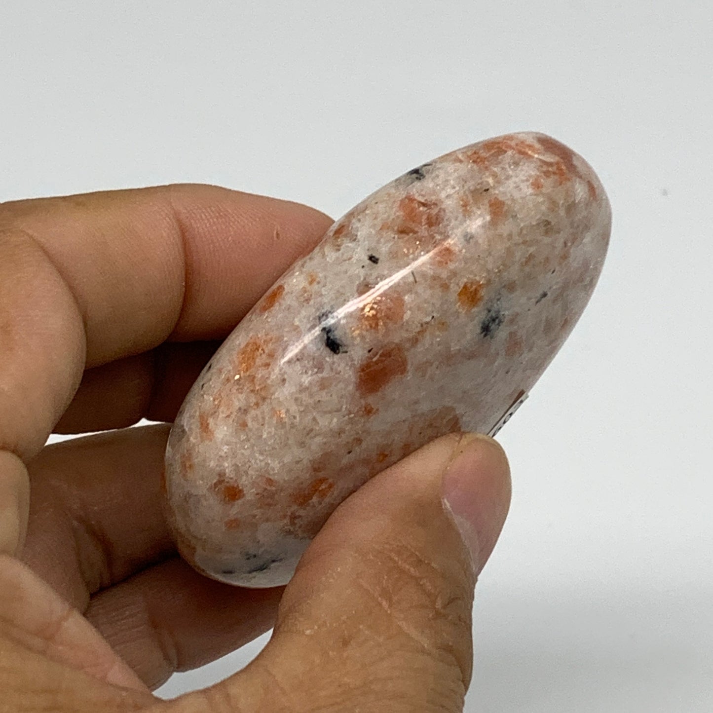 85.9g, 2.4"x1.7"x0.8", Natural Sunstone Palm-Stone Polished from India, B34603