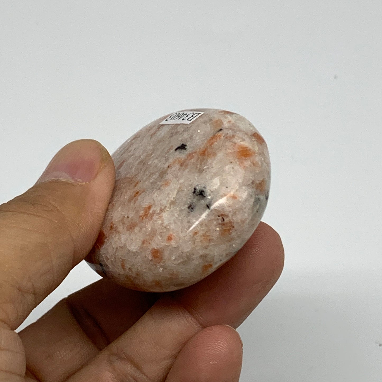 85.9g, 2.4"x1.7"x0.8", Natural Sunstone Palm-Stone Polished from India, B34603