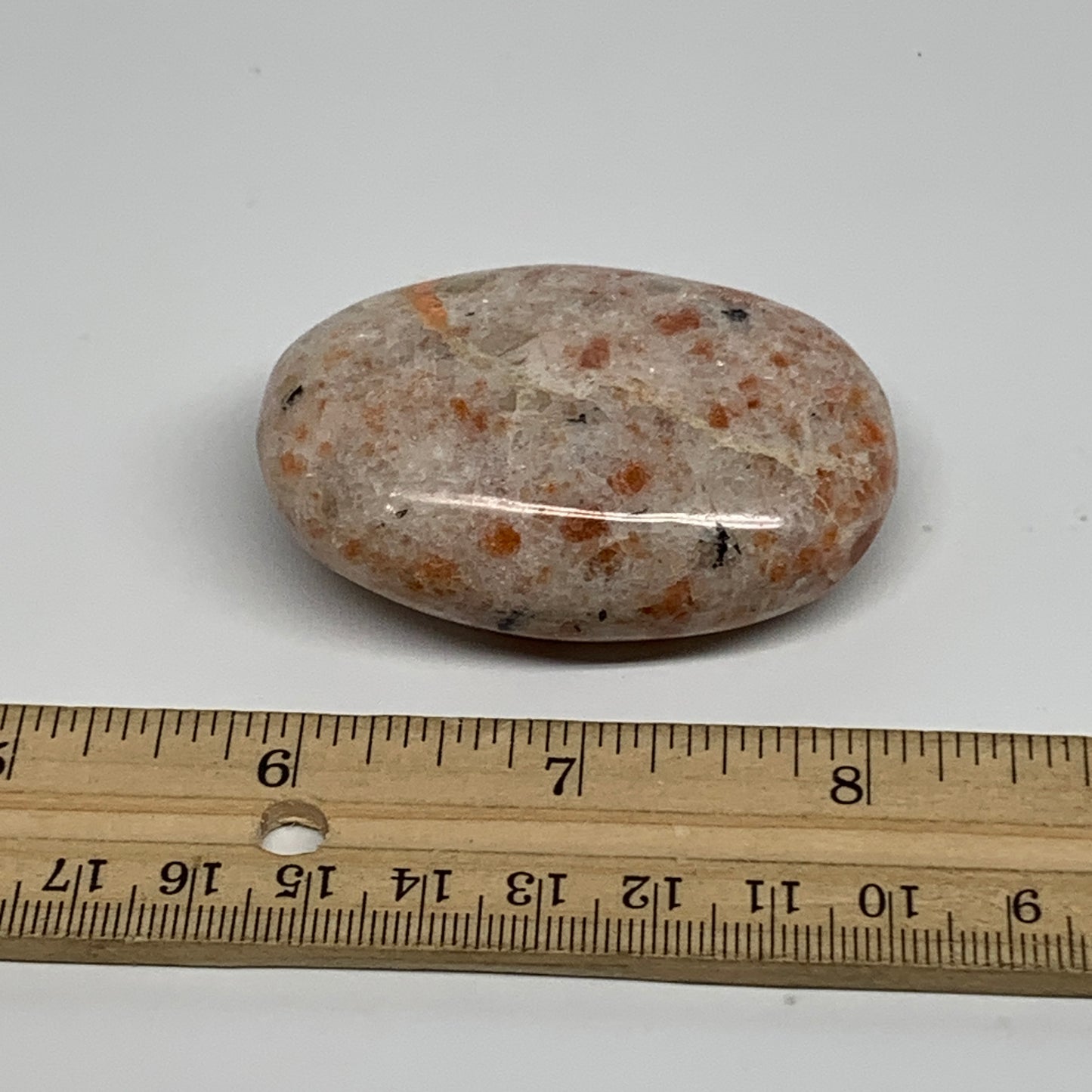 85.9g, 2.4"x1.7"x0.8", Natural Sunstone Palm-Stone Polished from India, B34603