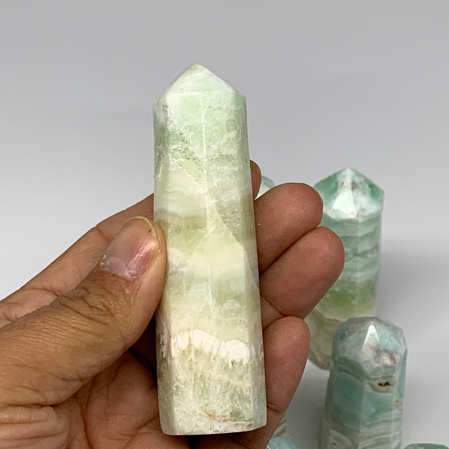 2.25 lbs, 2.2" - 4", 11 pcs, Caribbean Calcite Towers/Obelisks, B26380