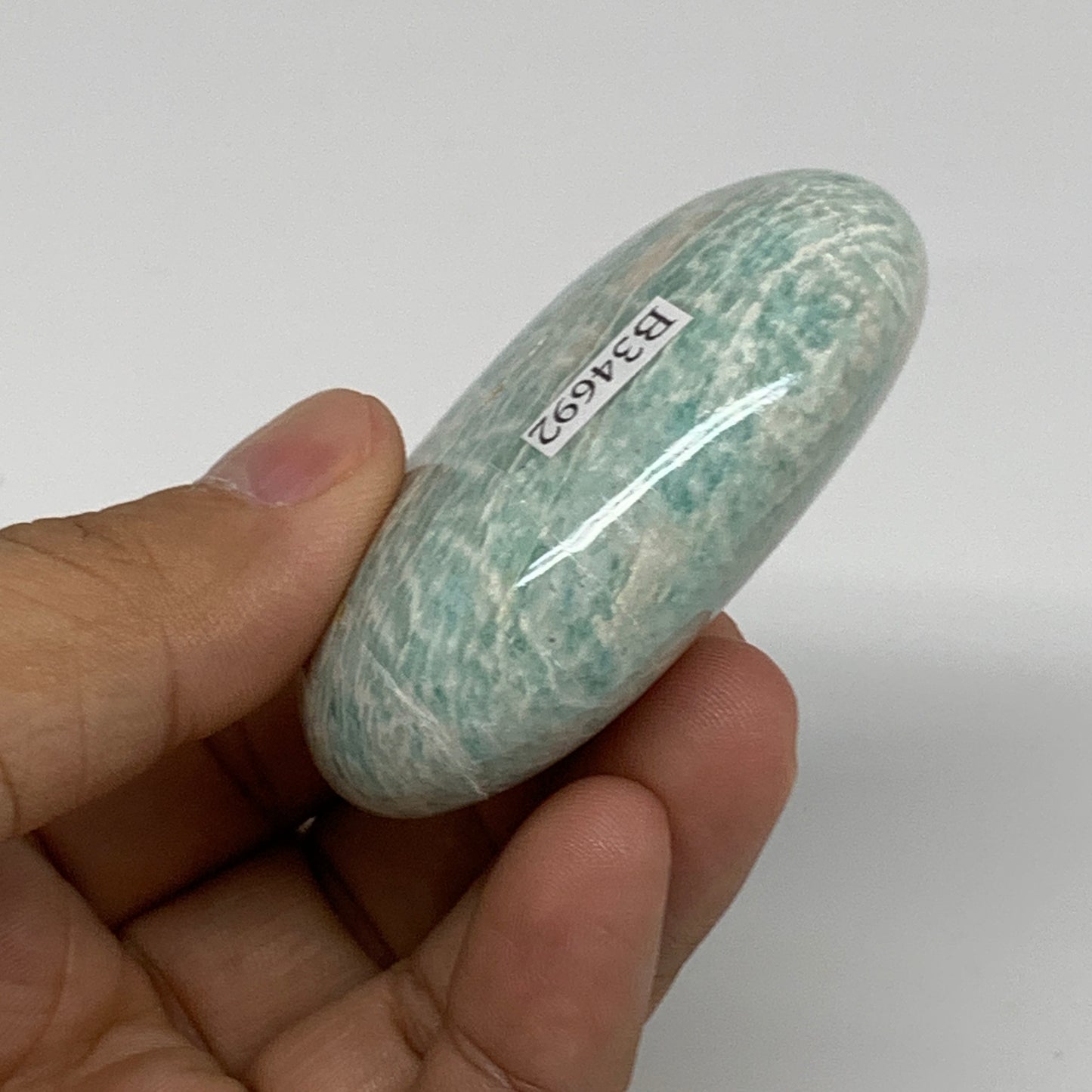 84.1g, 2.3"x1.7"x0.9", Natural Amazonite Palm-Stone Tumbled Polished, B34692