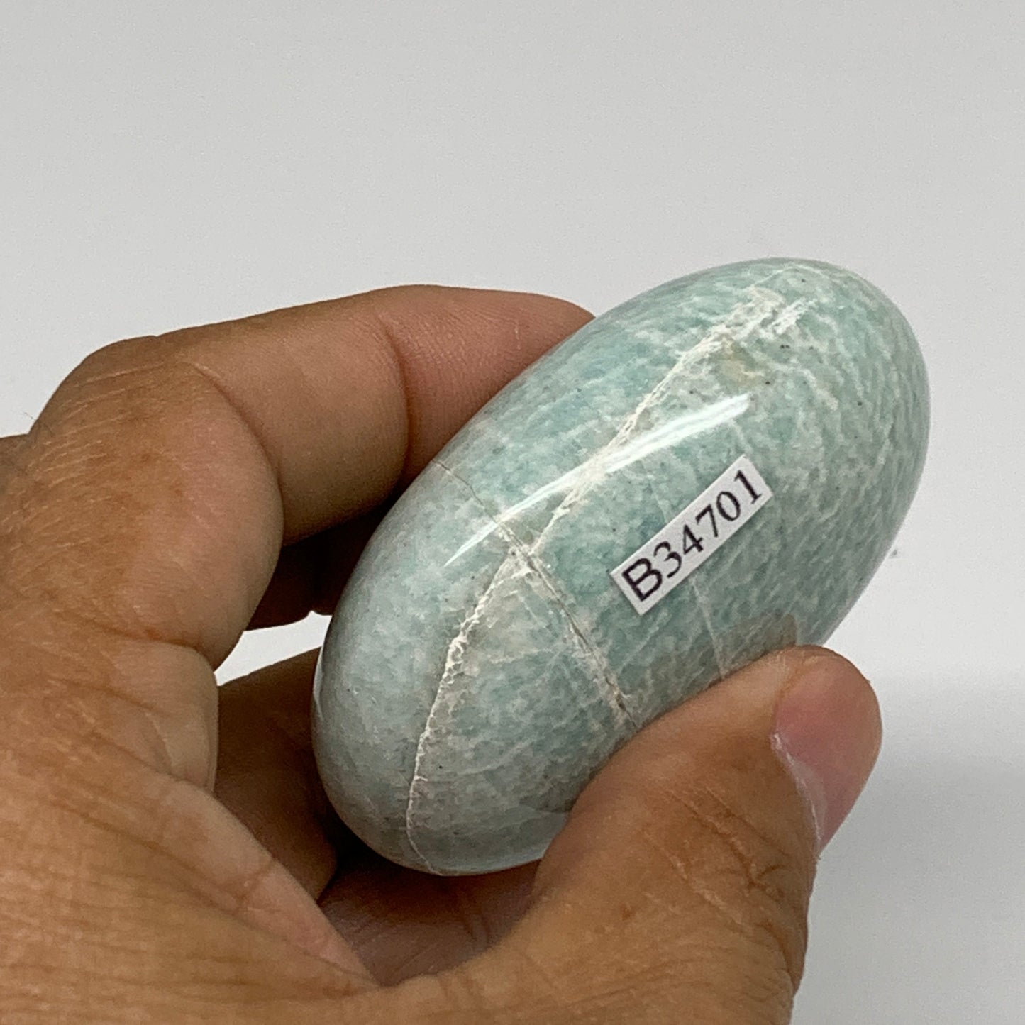 98.9g, 2.4"x1.7"x1", Natural Amazonite Palm-Stone Tumbled Polished, B34701