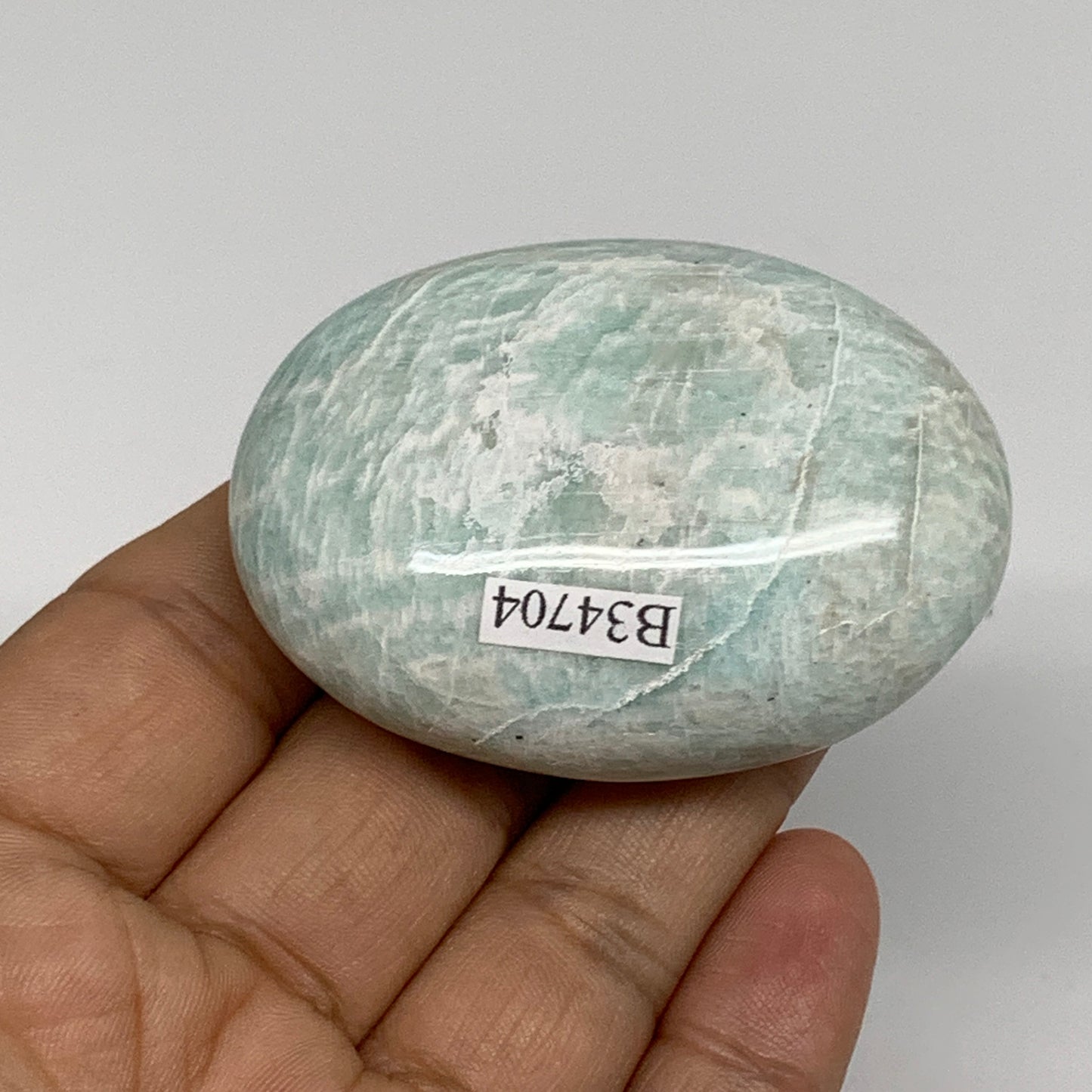 83g, 2.3"x1.6"x0.9", Natural Amazonite Palm-Stone Tumbled Polished, B34704
