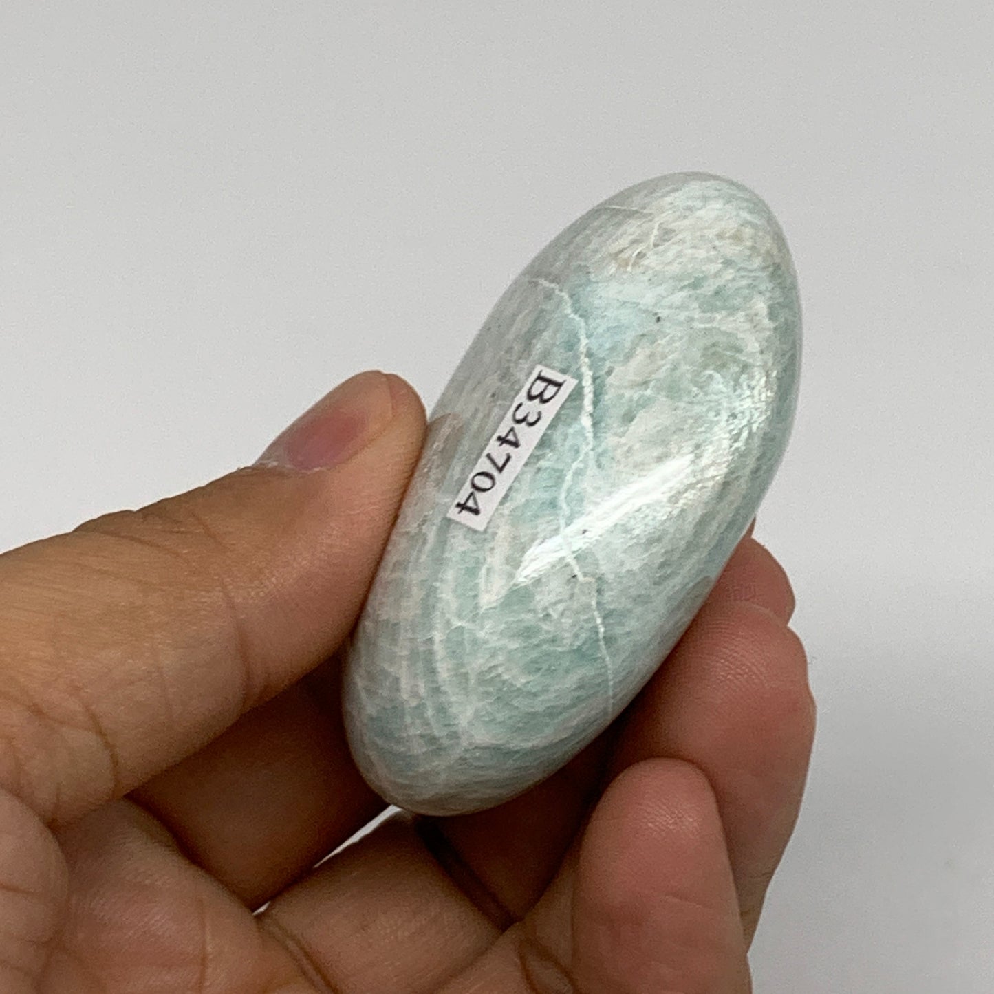 83g, 2.3"x1.6"x0.9", Natural Amazonite Palm-Stone Tumbled Polished, B34704