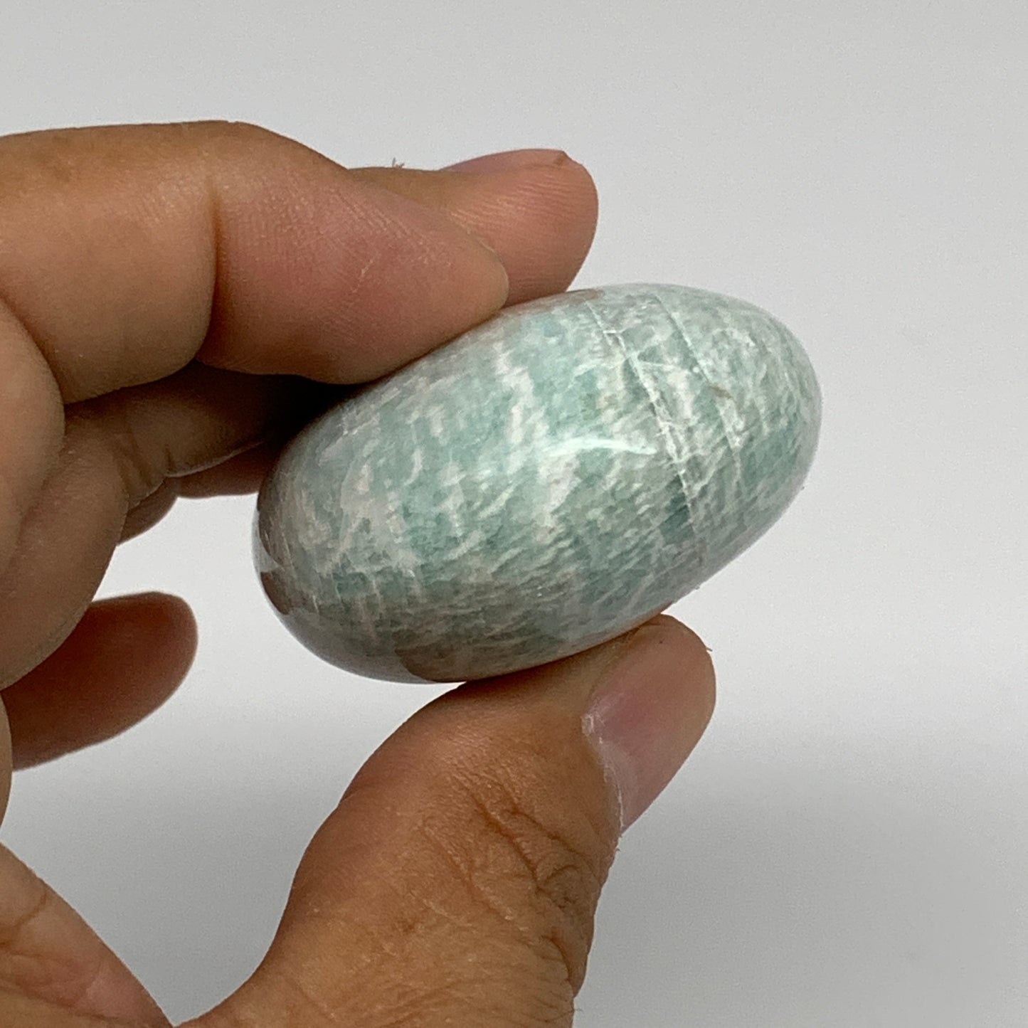 86.9g, 2.3"x1.6"x1", Natural Amazonite Palm-Stone Tumbled Polished, B34705