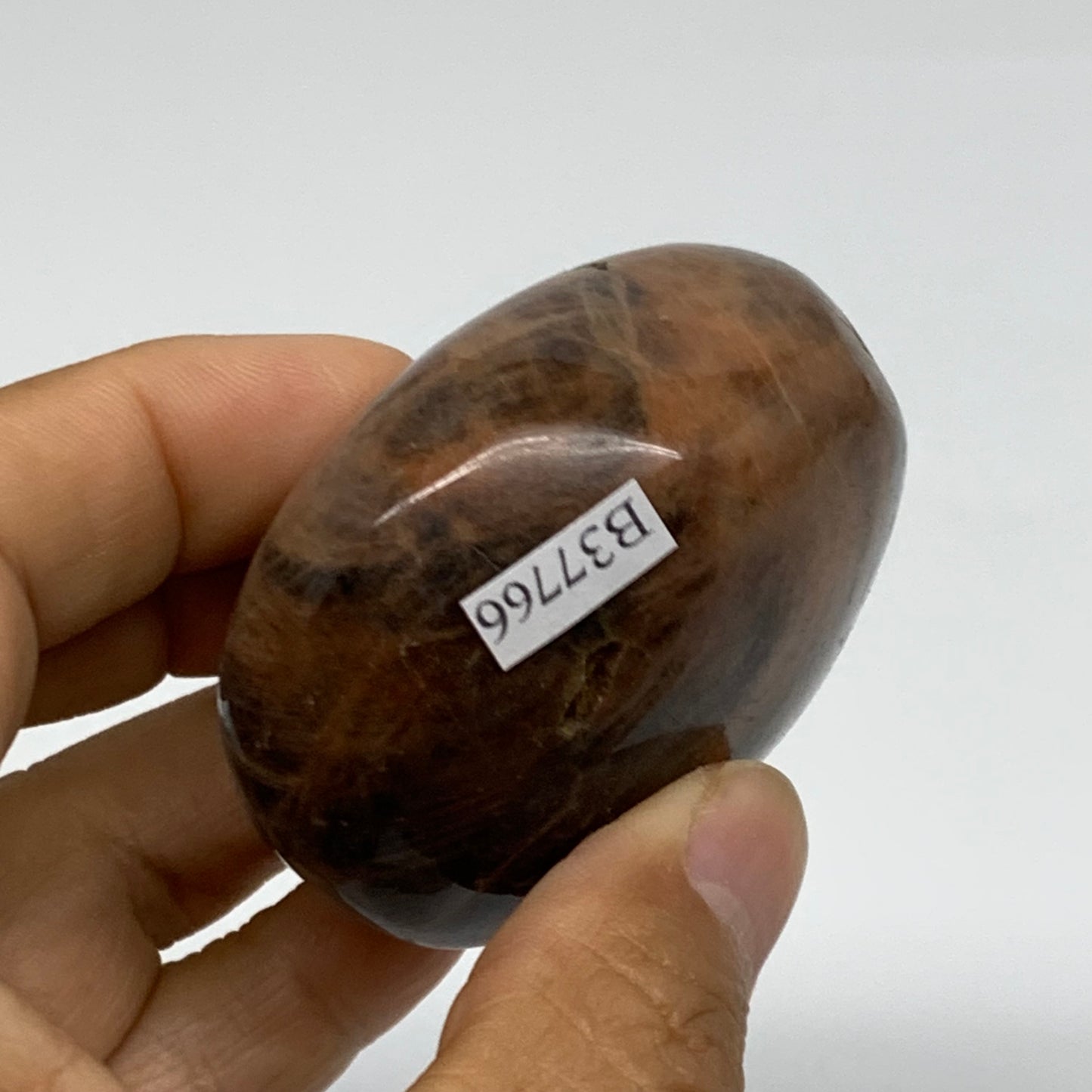 132.1g, 2.2"x2"x1.3",  Black Moonstone Crystal Palm-Stone Polished, B37766