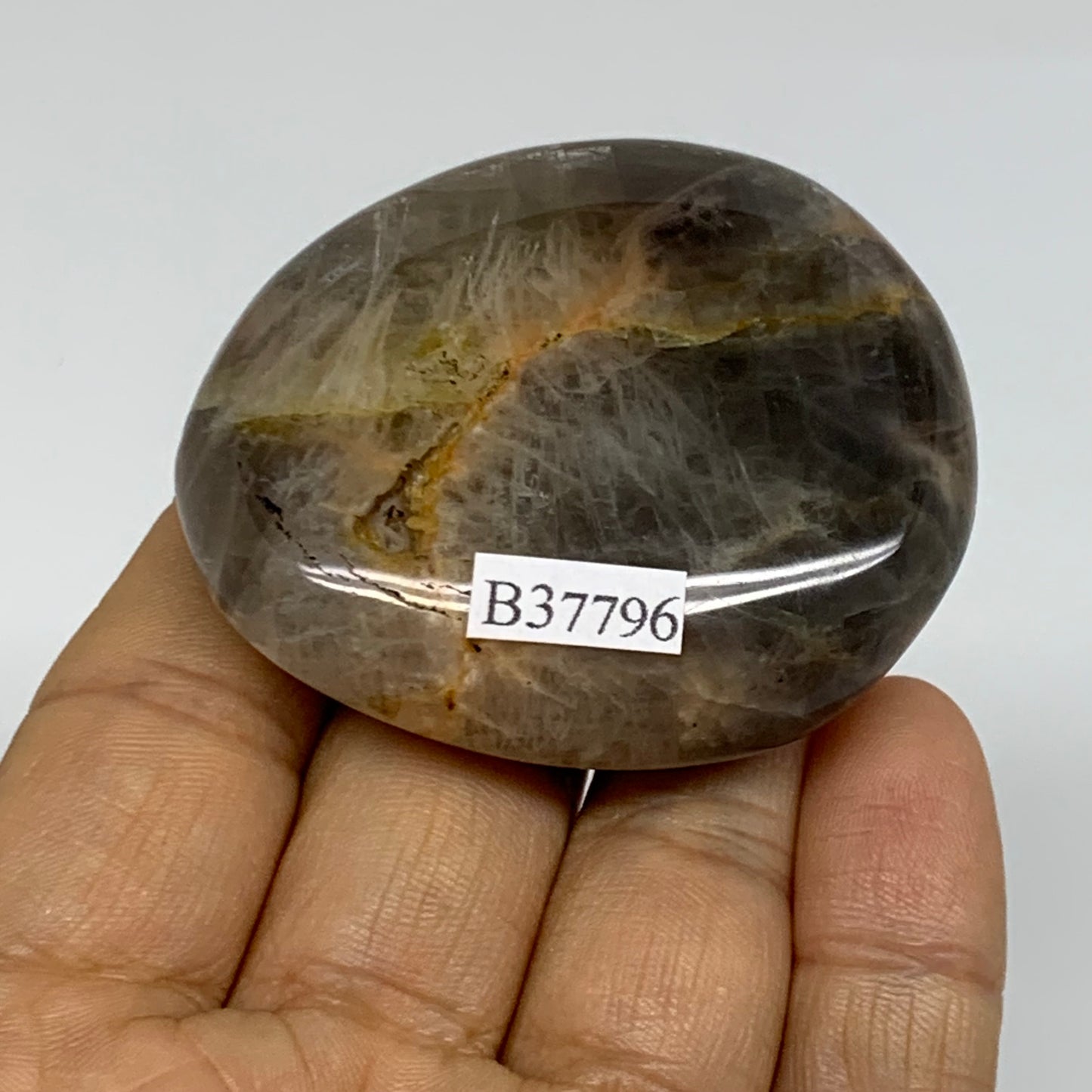 74g, 2.2"x1.9"x0.7",  Black Moonstone Crystal Palm-Stone Polished, B37796