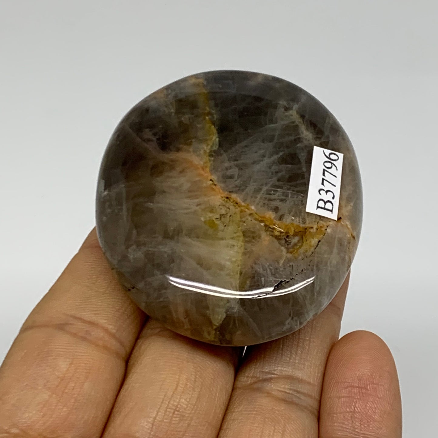 74g, 2.2"x1.9"x0.7",  Black Moonstone Crystal Palm-Stone Polished, B37796