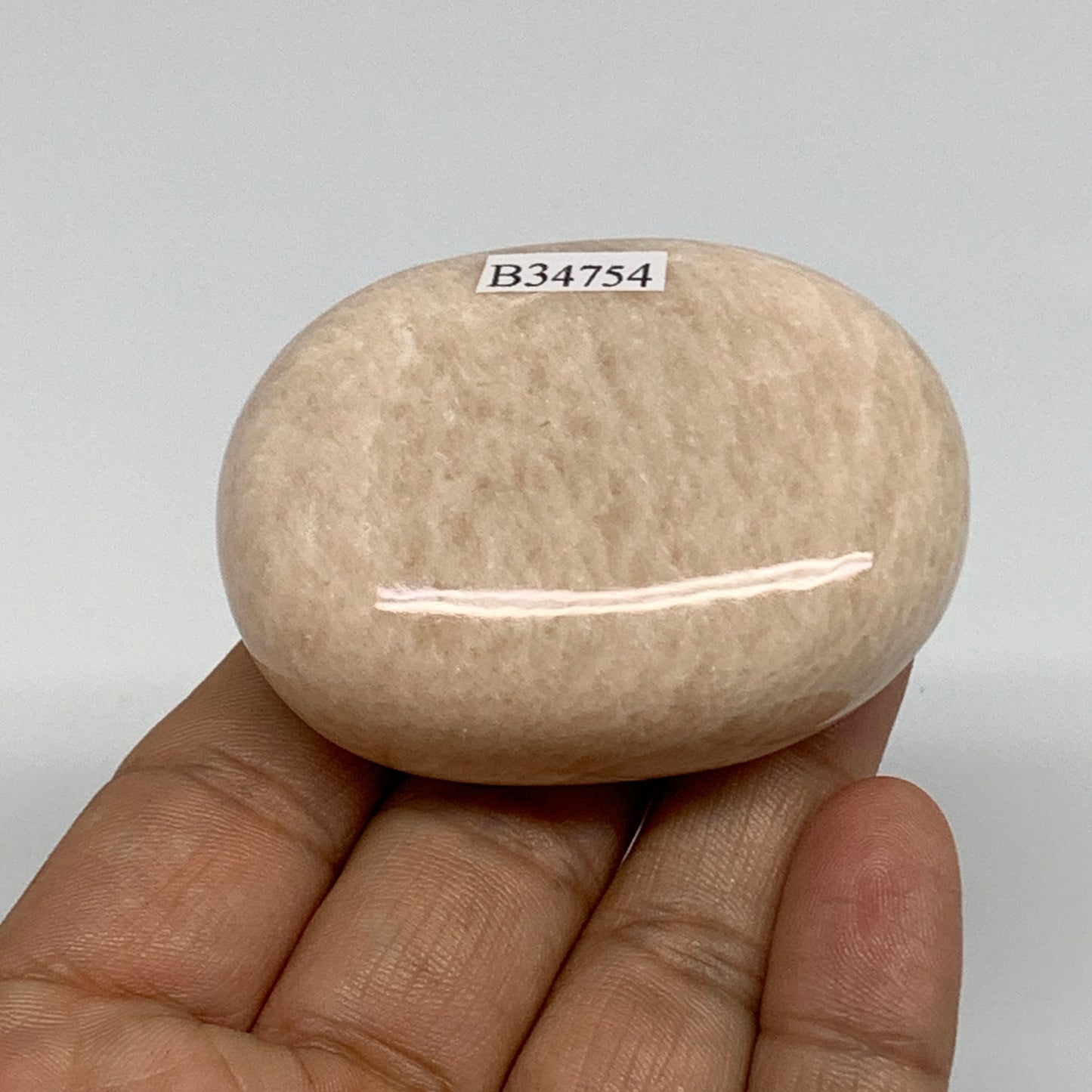 106.4g,2.3"x1.7"x1", Peach Moonstone Polished Palm-Stone Gemstone, B34754