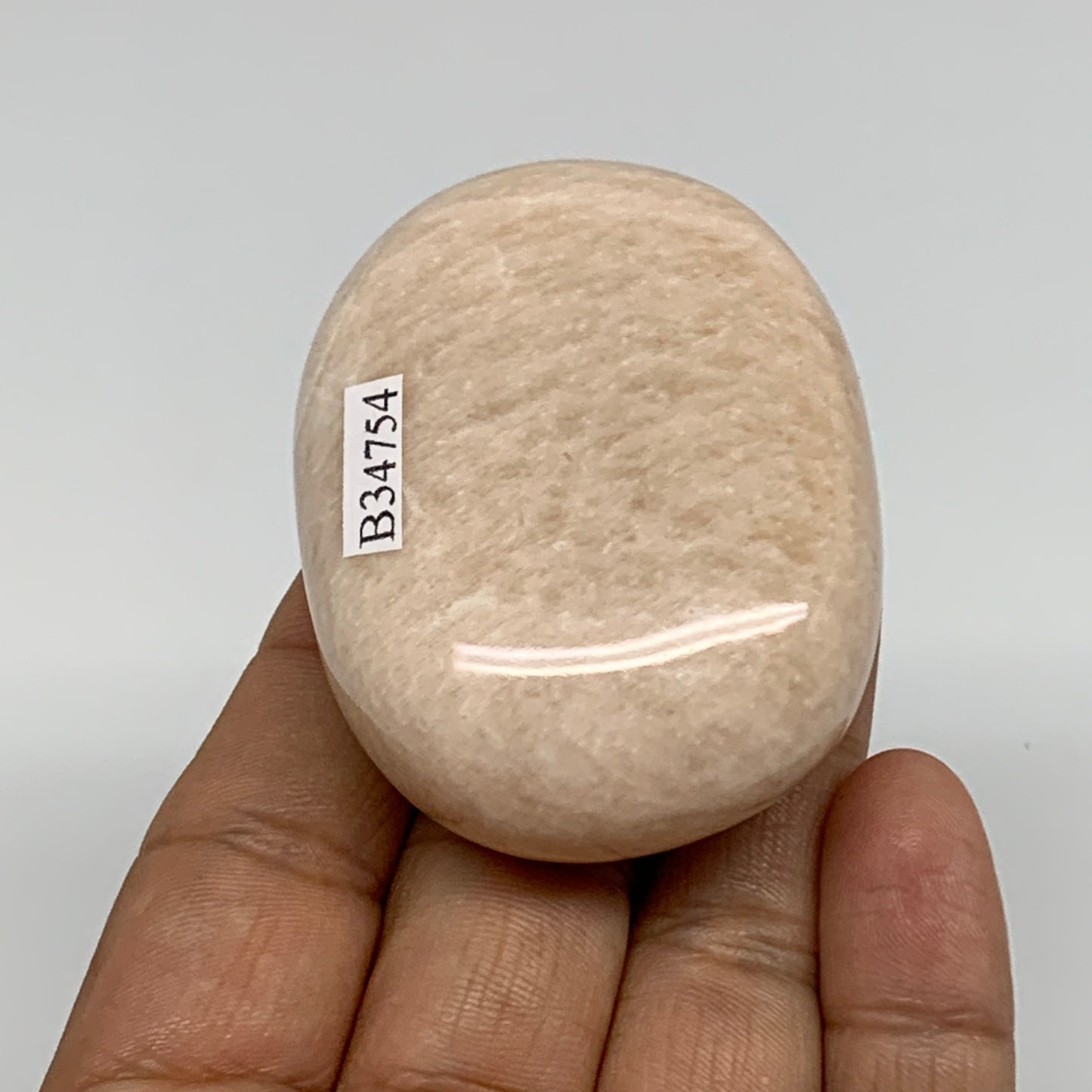 106.4g,2.3"x1.7"x1", Peach Moonstone Polished Palm-Stone Gemstone, B34754