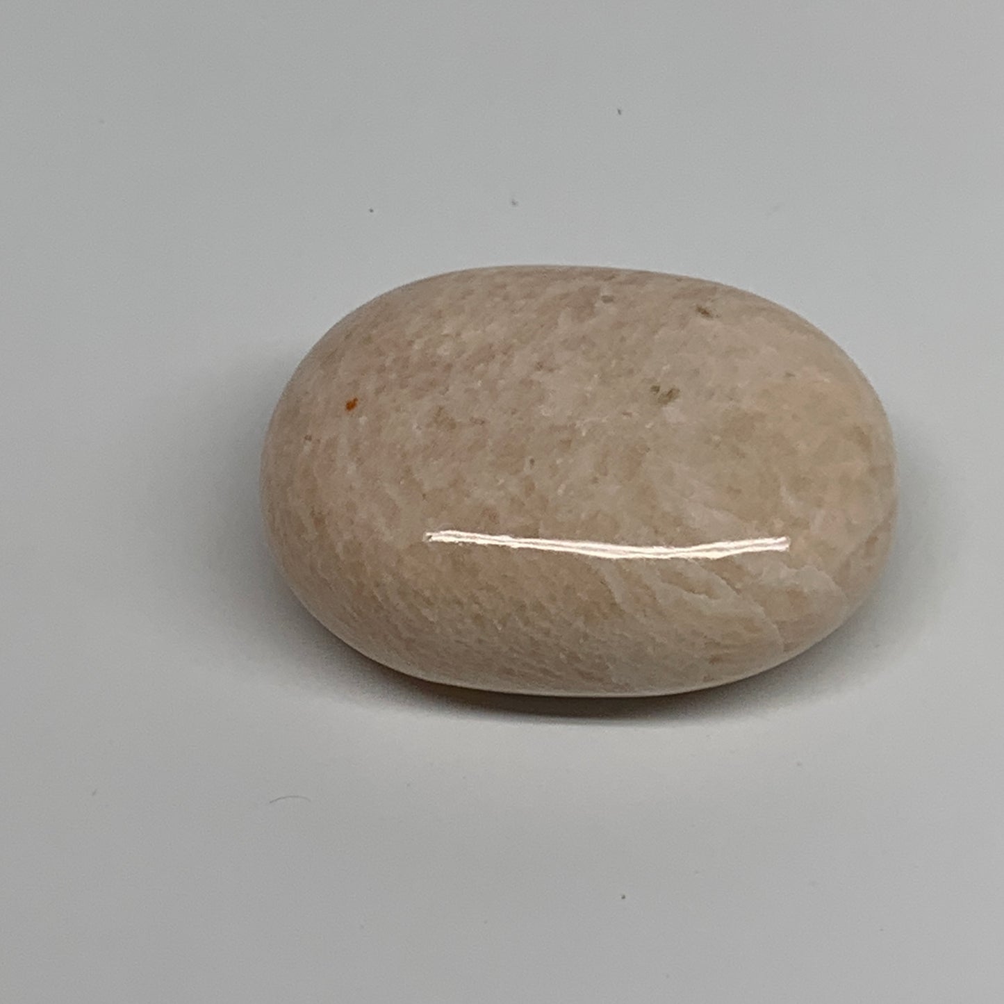 106.4g,2.3"x1.7"x1", Peach Moonstone Polished Palm-Stone Gemstone, B34754