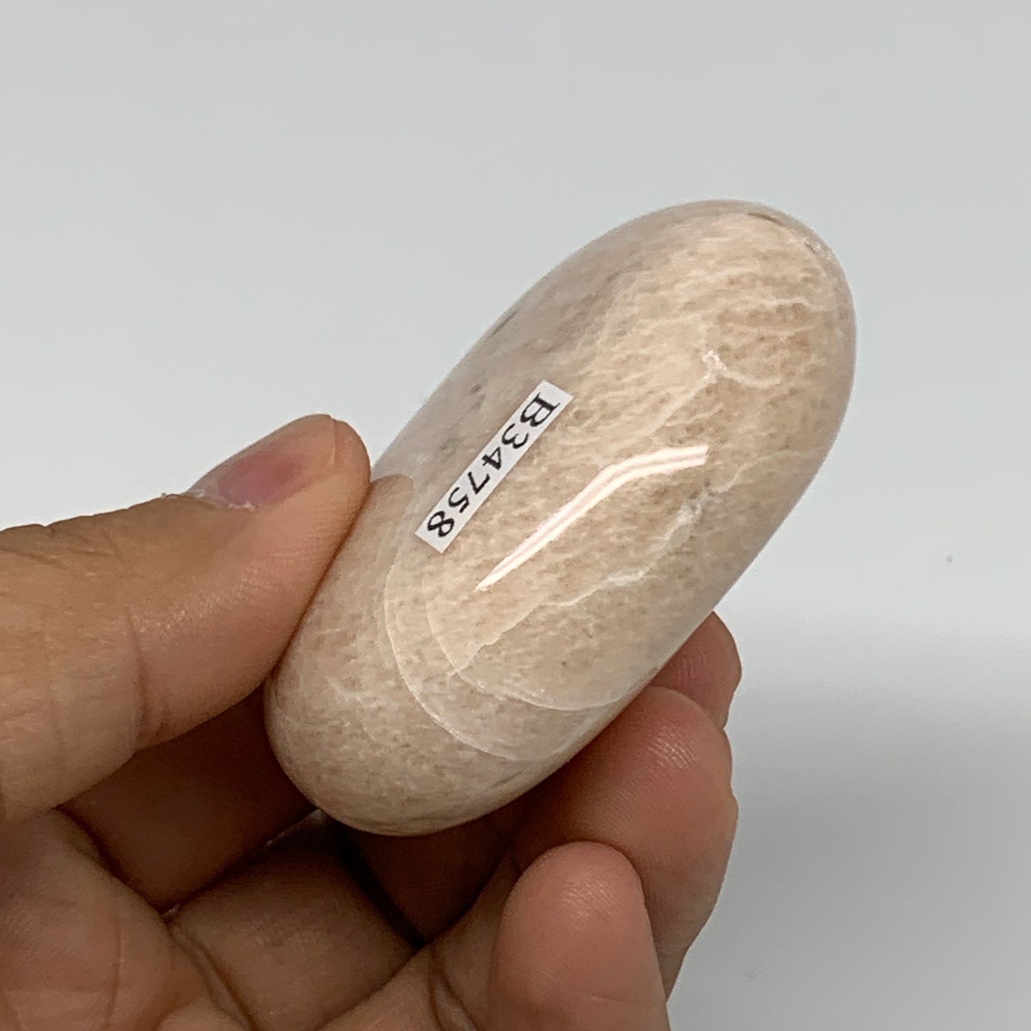 94.2g,2.3"x1.7"x0.9", Peach Moonstone Polished Palm-Stone Gemstone, B34758