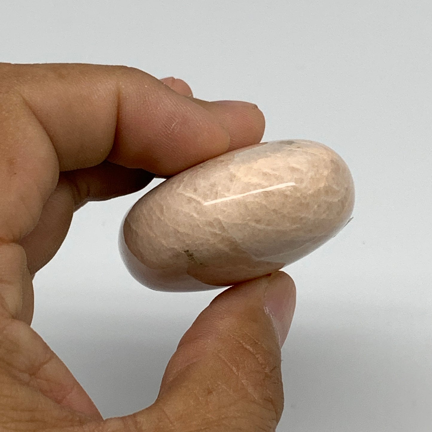 87.8g,2.2"x1.7"x0.9", Peach Moonstone Polished Palm-Stone Gemstone, B34759