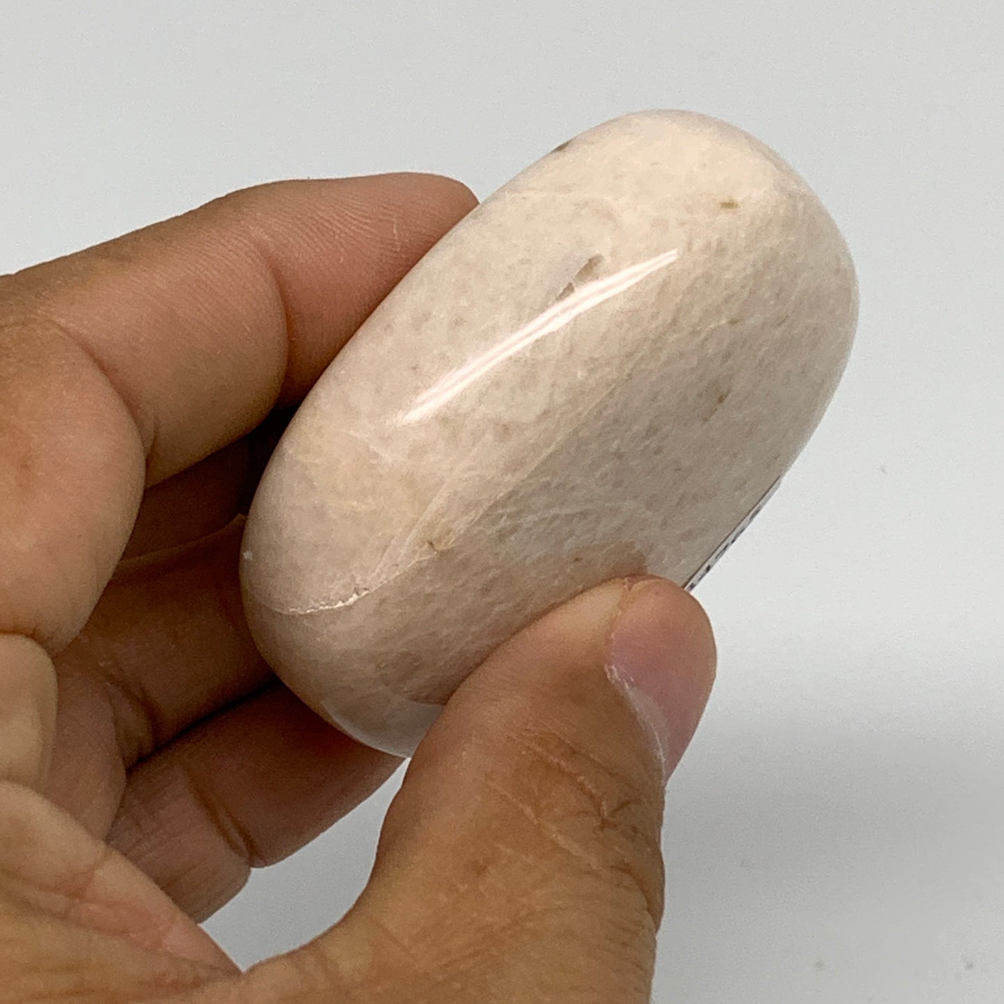 87g,2.1"x1.6"x0.9", Peach Moonstone Polished Palm-Stone Gemstone, B34765