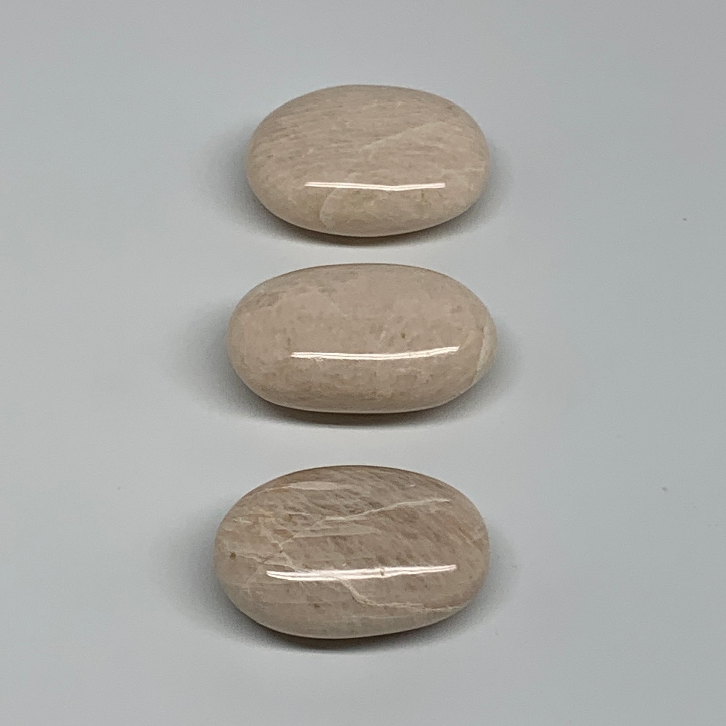 147.7g,1.9"-2", 3pcs, Peach Moonstone Polished Palm-Stone Gemstone, B34767