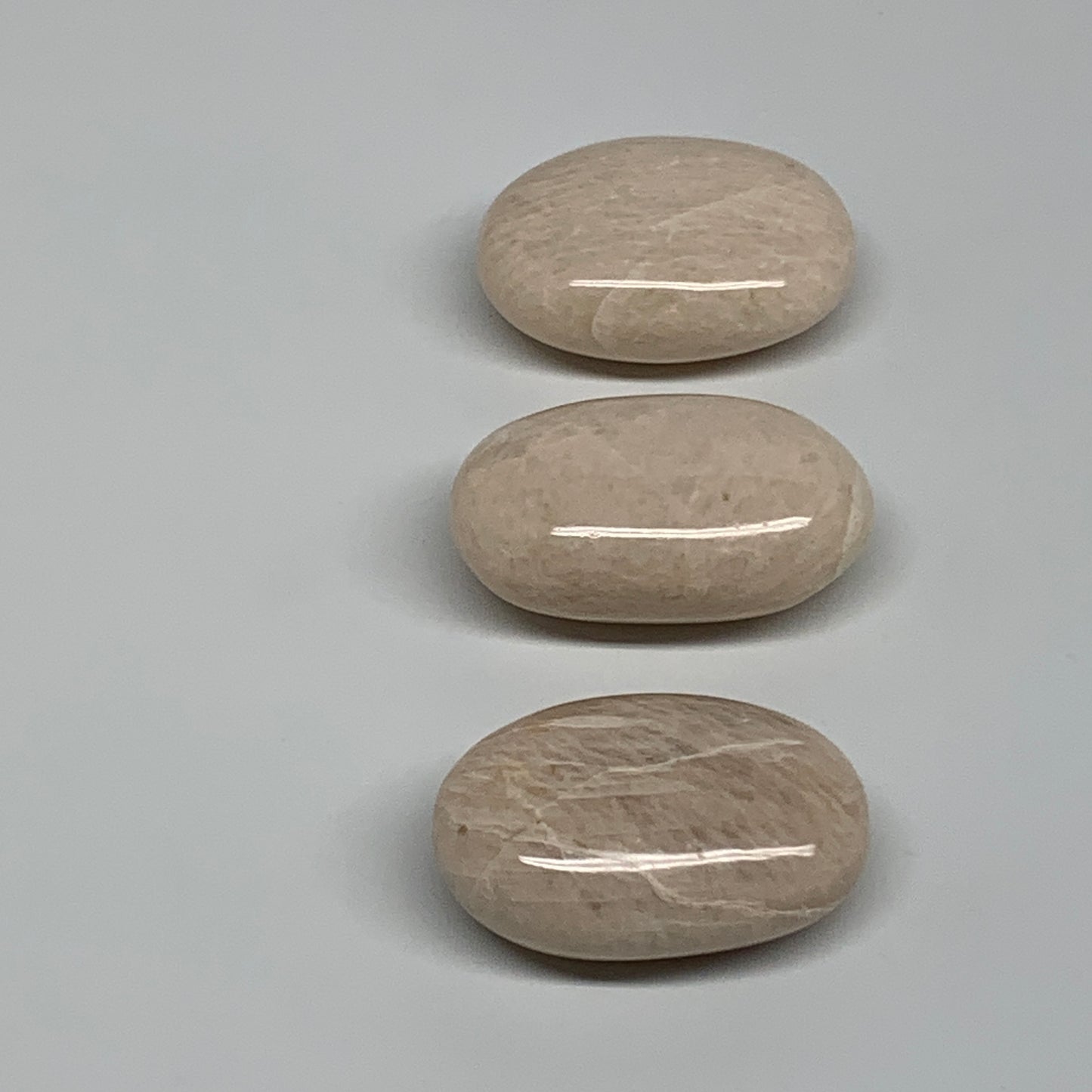 147.7g,1.9"-2", 3pcs, Peach Moonstone Polished Palm-Stone Gemstone, B34767