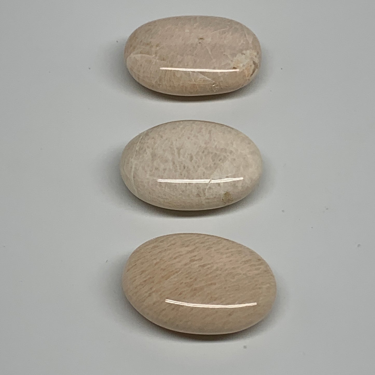 145.2g,1.9"-2", 3pcs, Peach Moonstone Polished Palm-Stone Gemstone, B34768