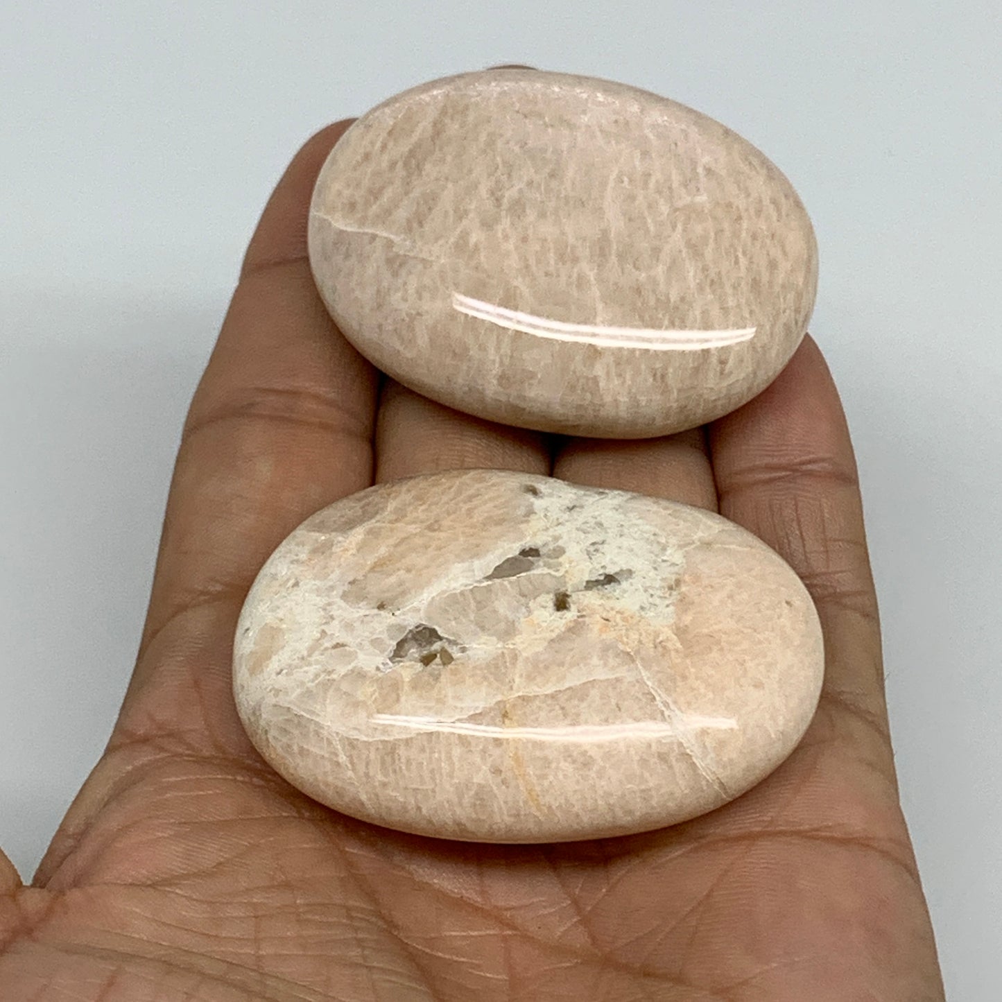 122.6g,2.1"-2.2", 2pcs, Peach Moonstone Polished Palm-Stone Gemstone, B34770
