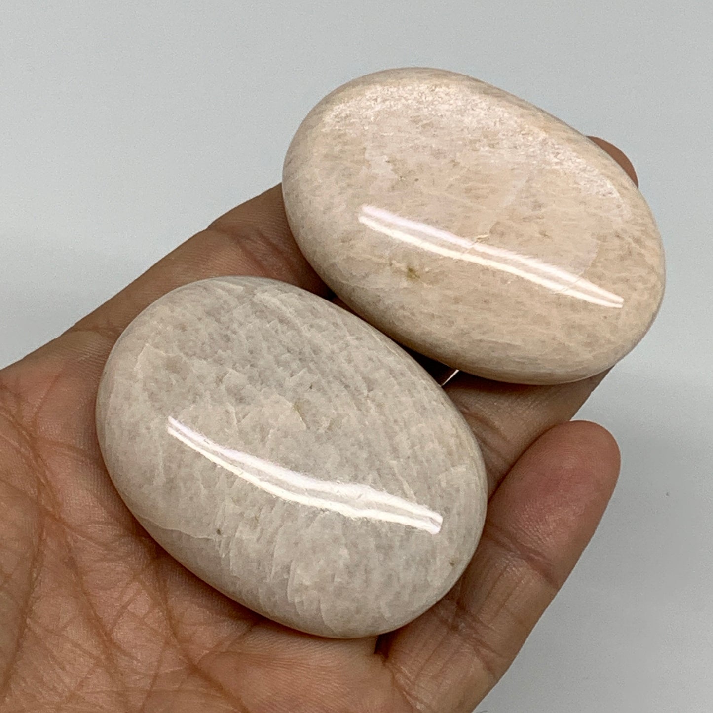 120g,2.1"-2.2", 2pcs, Peach Moonstone Polished Palm-Stone Gemstone, B34775