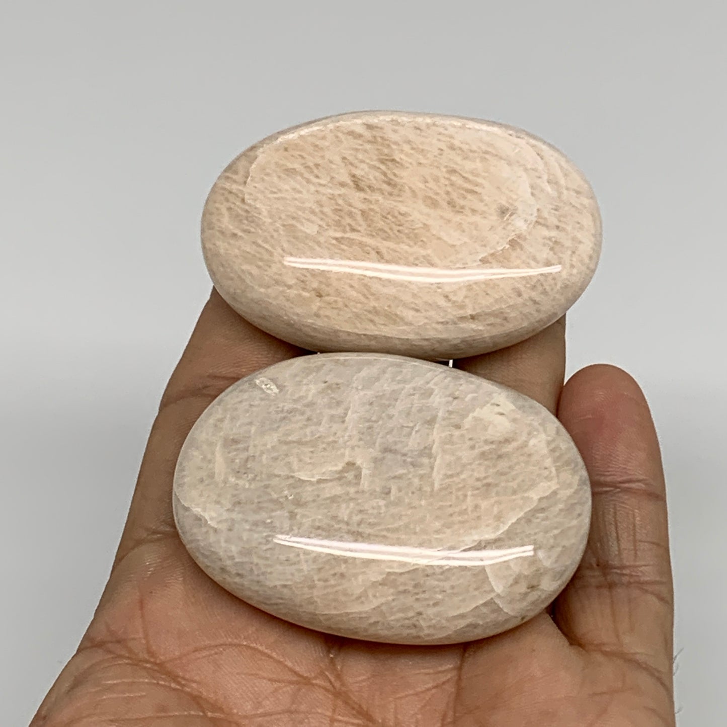 120g,2.1"-2.2", 2pcs, Peach Moonstone Polished Palm-Stone Gemstone, B34775