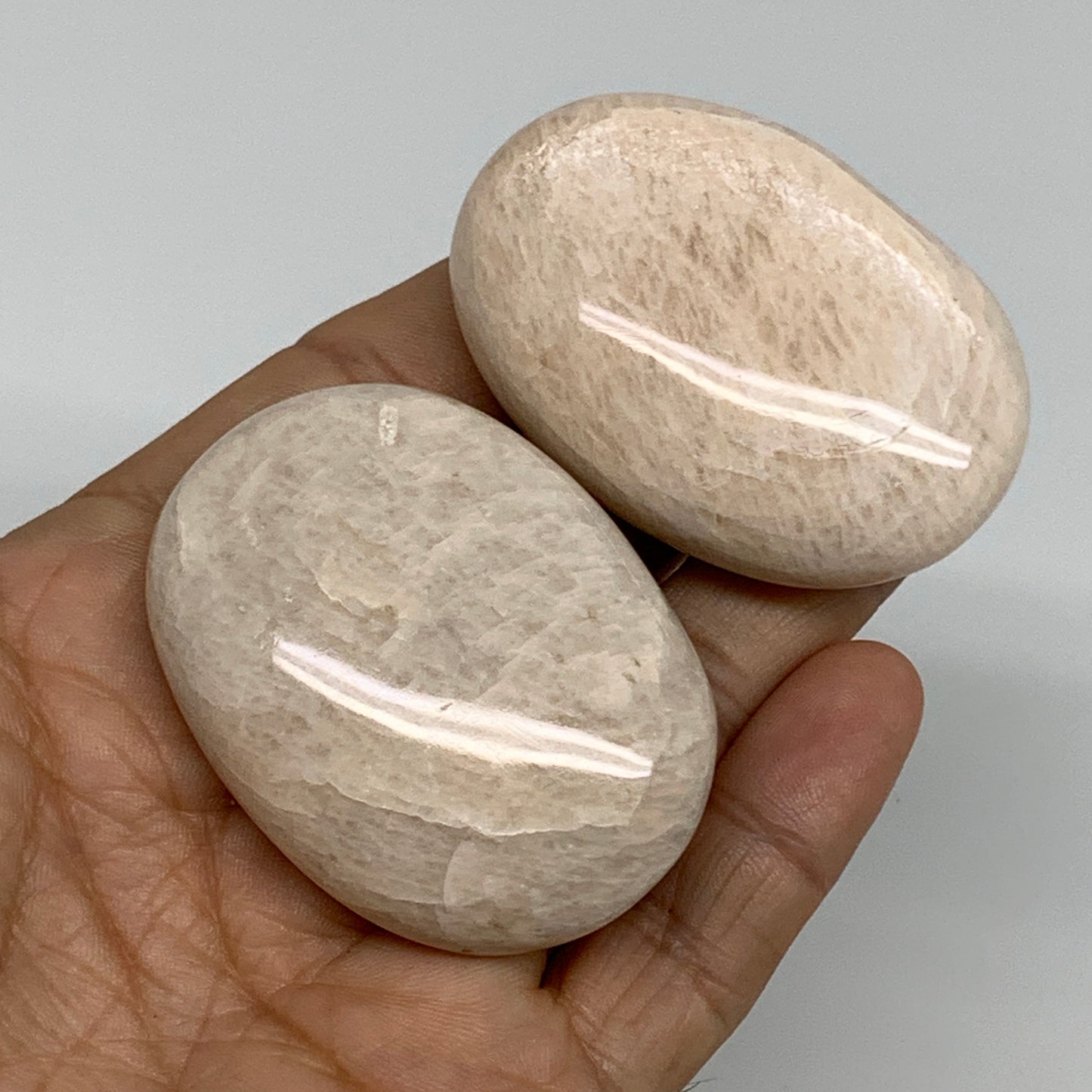 120g,2.1"-2.2", 2pcs, Peach Moonstone Polished Palm-Stone Gemstone, B34775