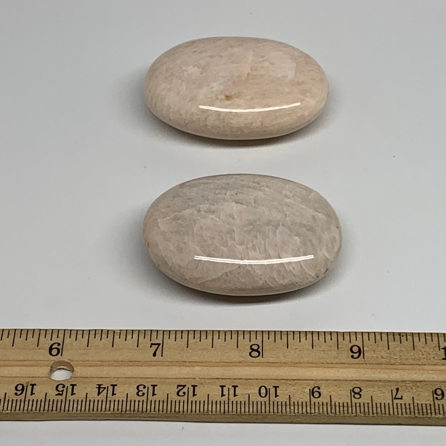 120g,2.1"-2.2", 2pcs, Peach Moonstone Polished Palm-Stone Gemstone, B34775