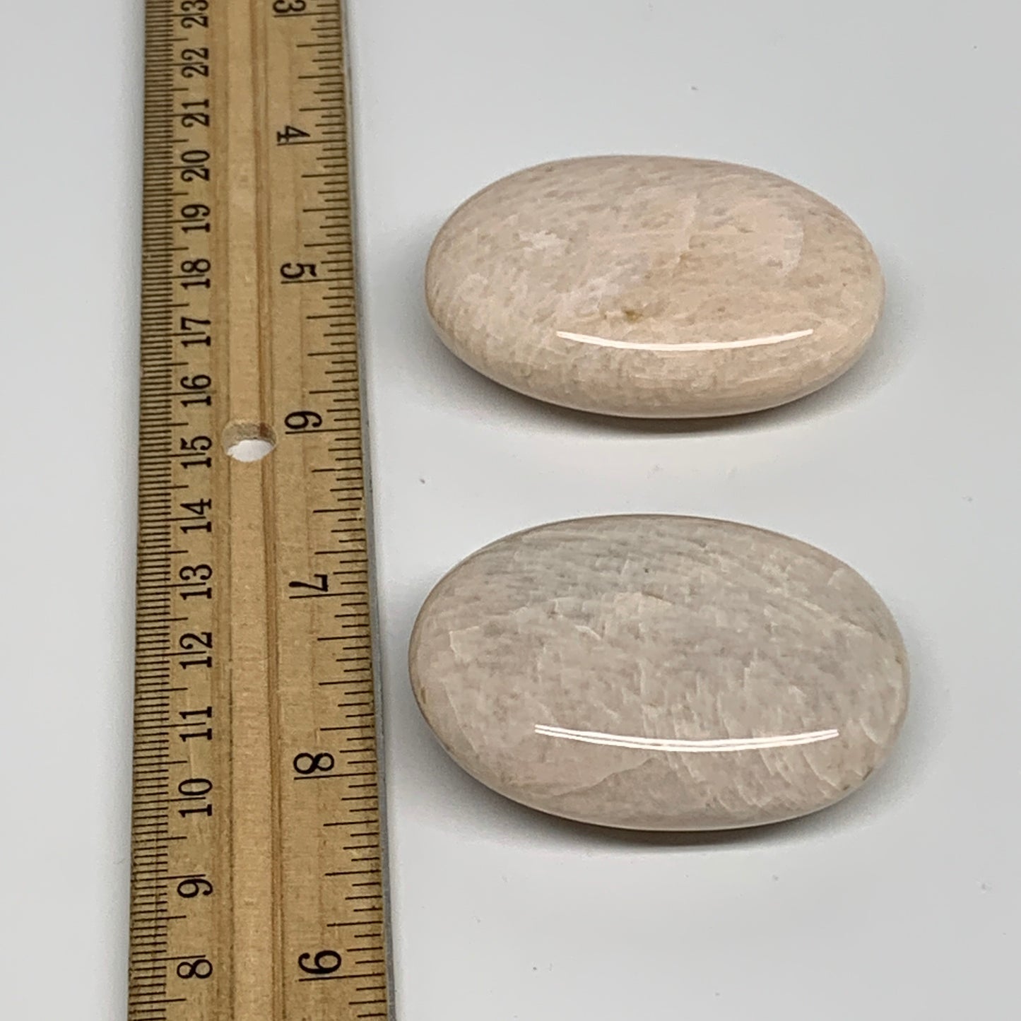 120g,2.1"-2.2", 2pcs, Peach Moonstone Polished Palm-Stone Gemstone, B34775