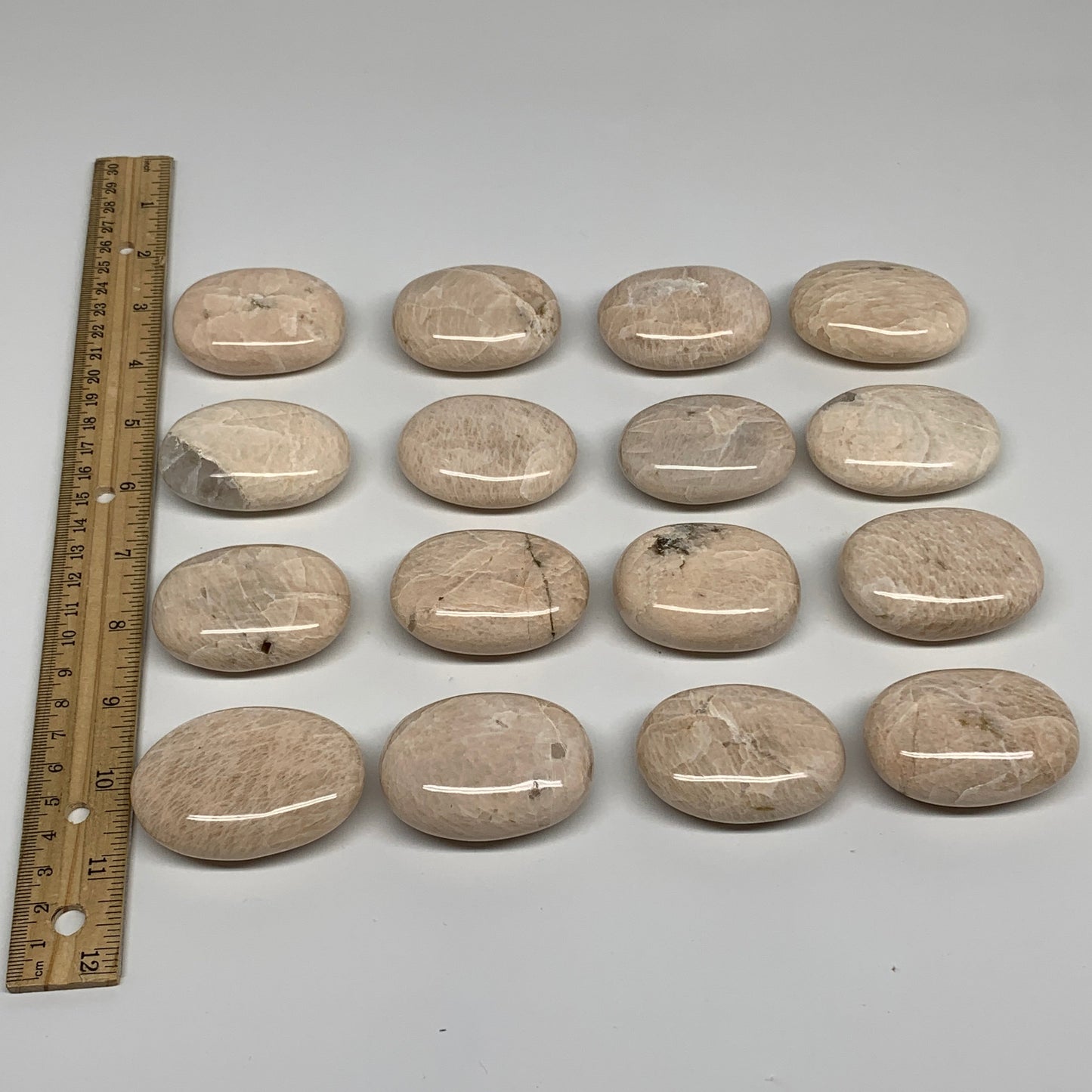 2.49 lbs (1130 Grams), 2"-2.3", 16pcs, Peach/White Moonstone Palm-Stone, B34779