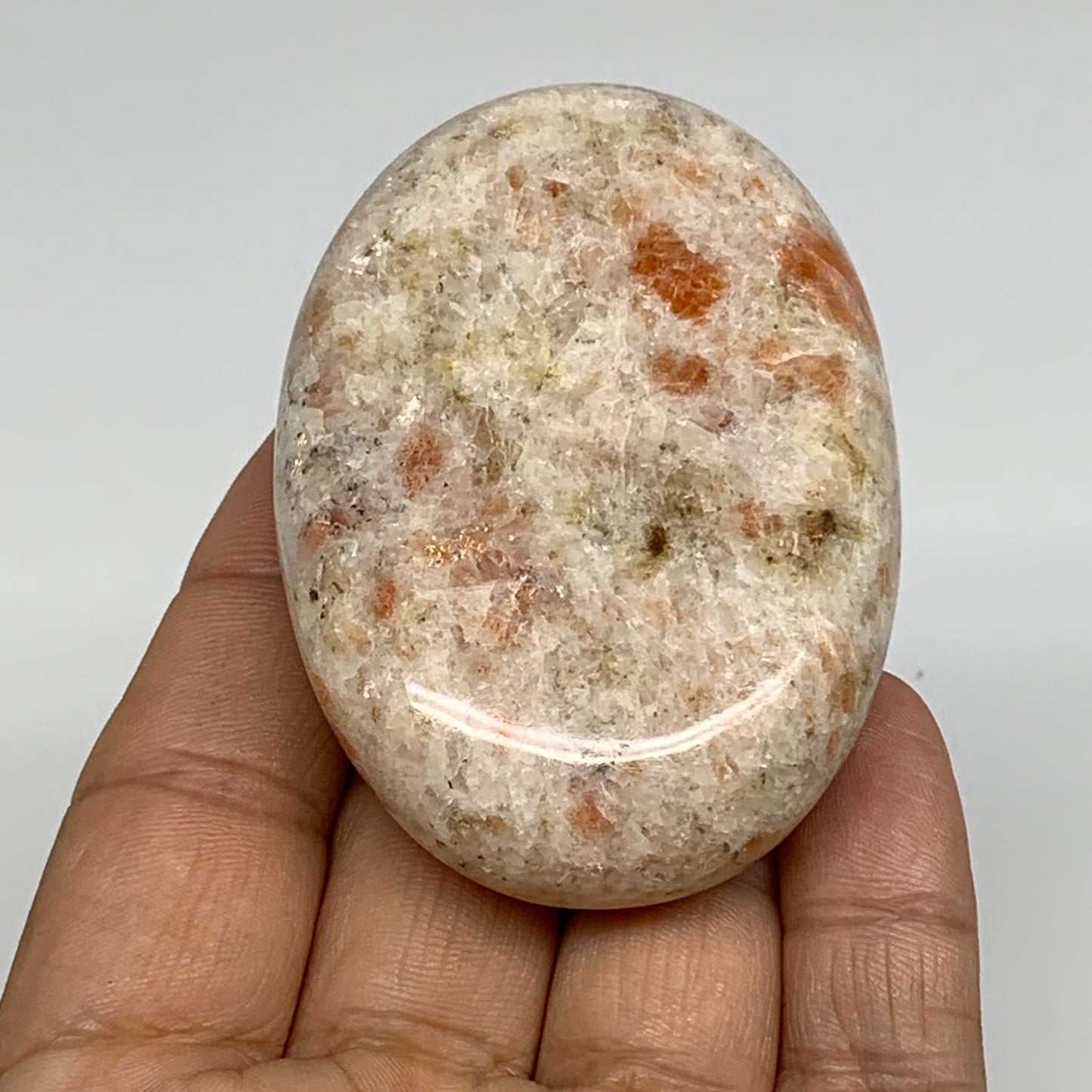 112.3g, 2.7"x1.9"x0.8", Natural Sunstone Palm-Stone Polished from India, B34782