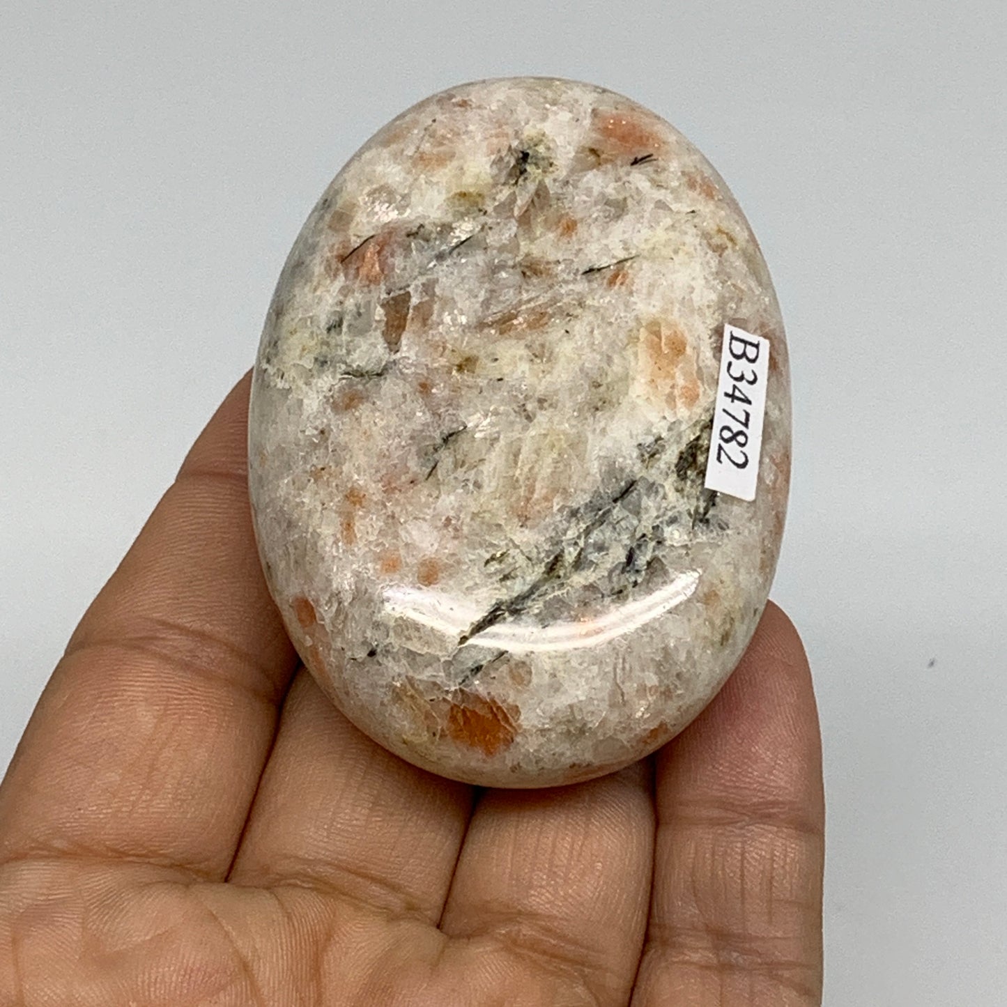 112.3g, 2.7"x1.9"x0.8", Natural Sunstone Palm-Stone Polished from India, B34782