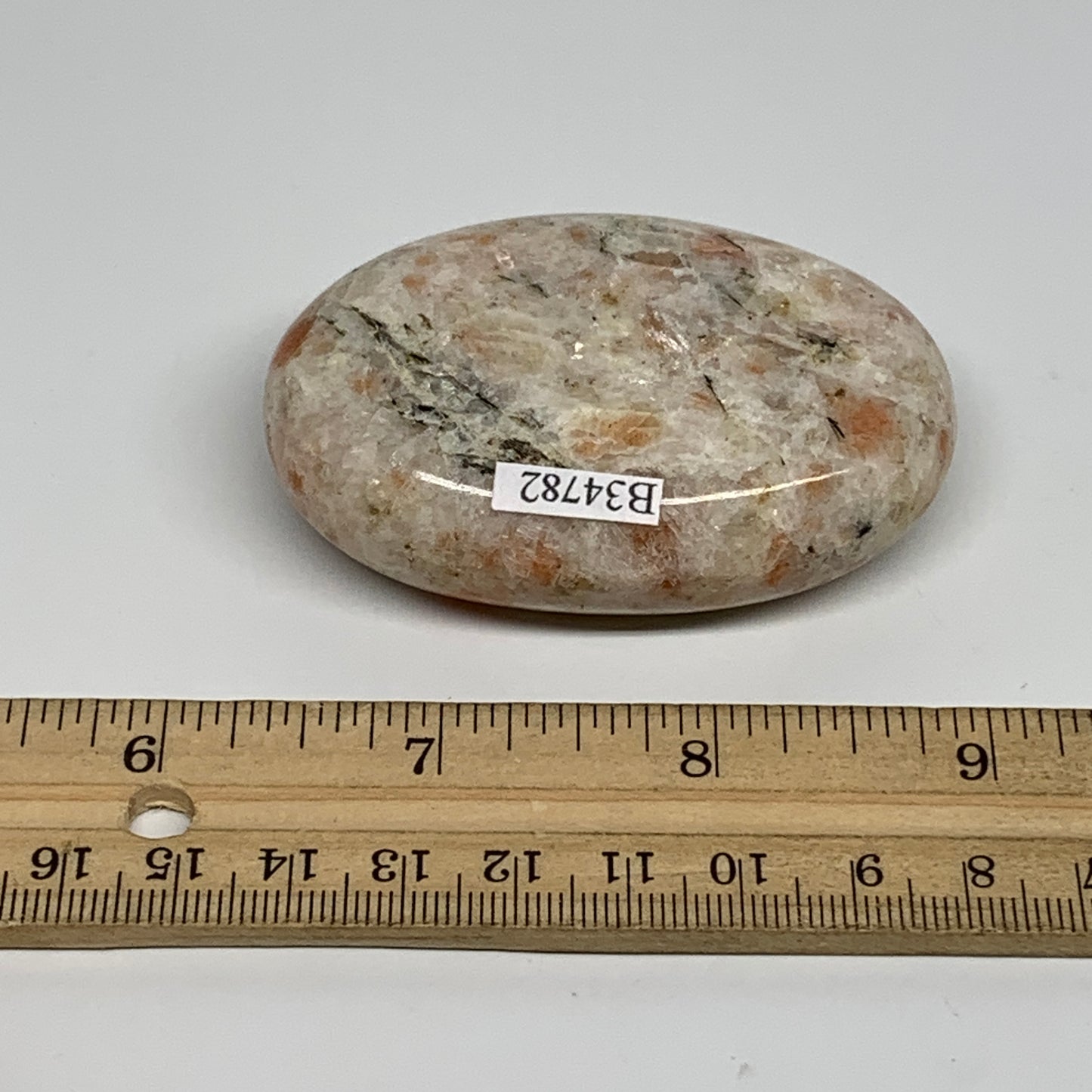 112.3g, 2.7"x1.9"x0.8", Natural Sunstone Palm-Stone Polished from India, B34782