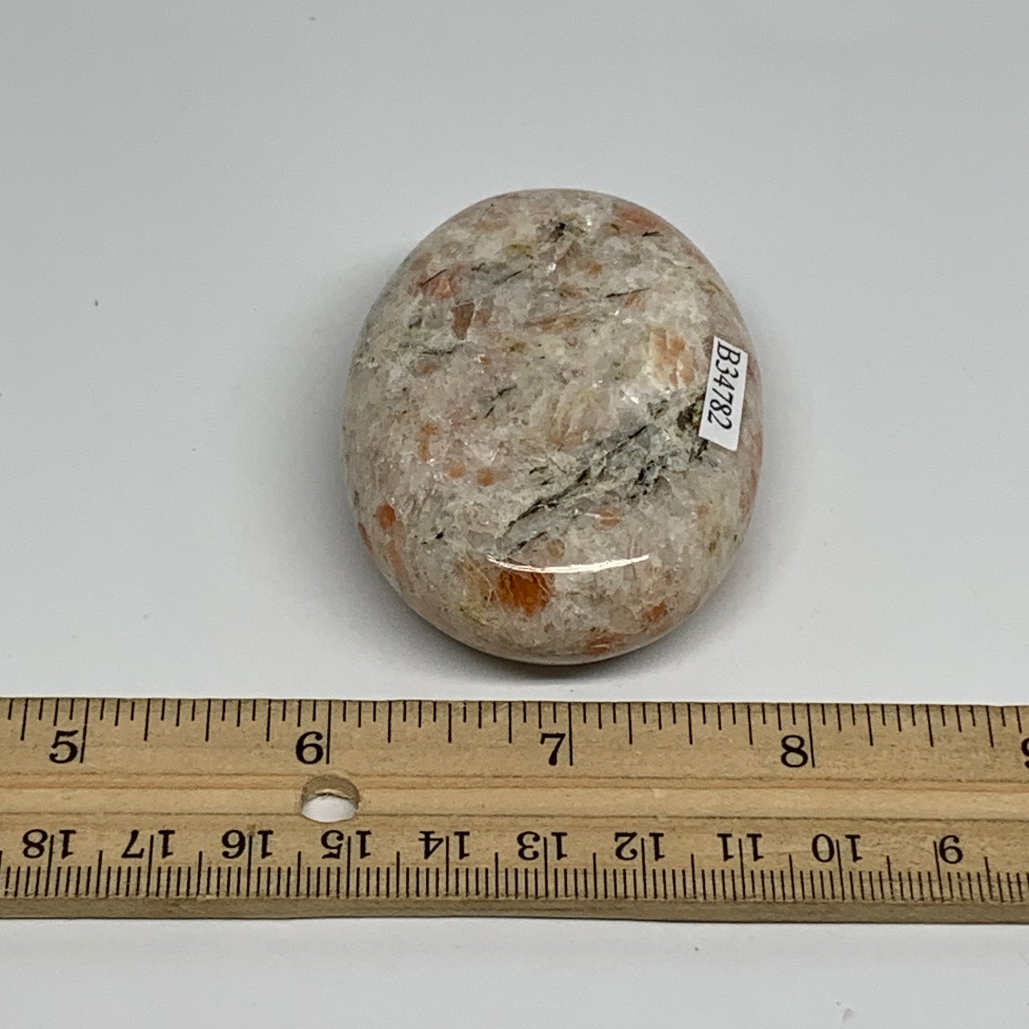 112.3g, 2.7"x1.9"x0.8", Natural Sunstone Palm-Stone Polished from India, B34782