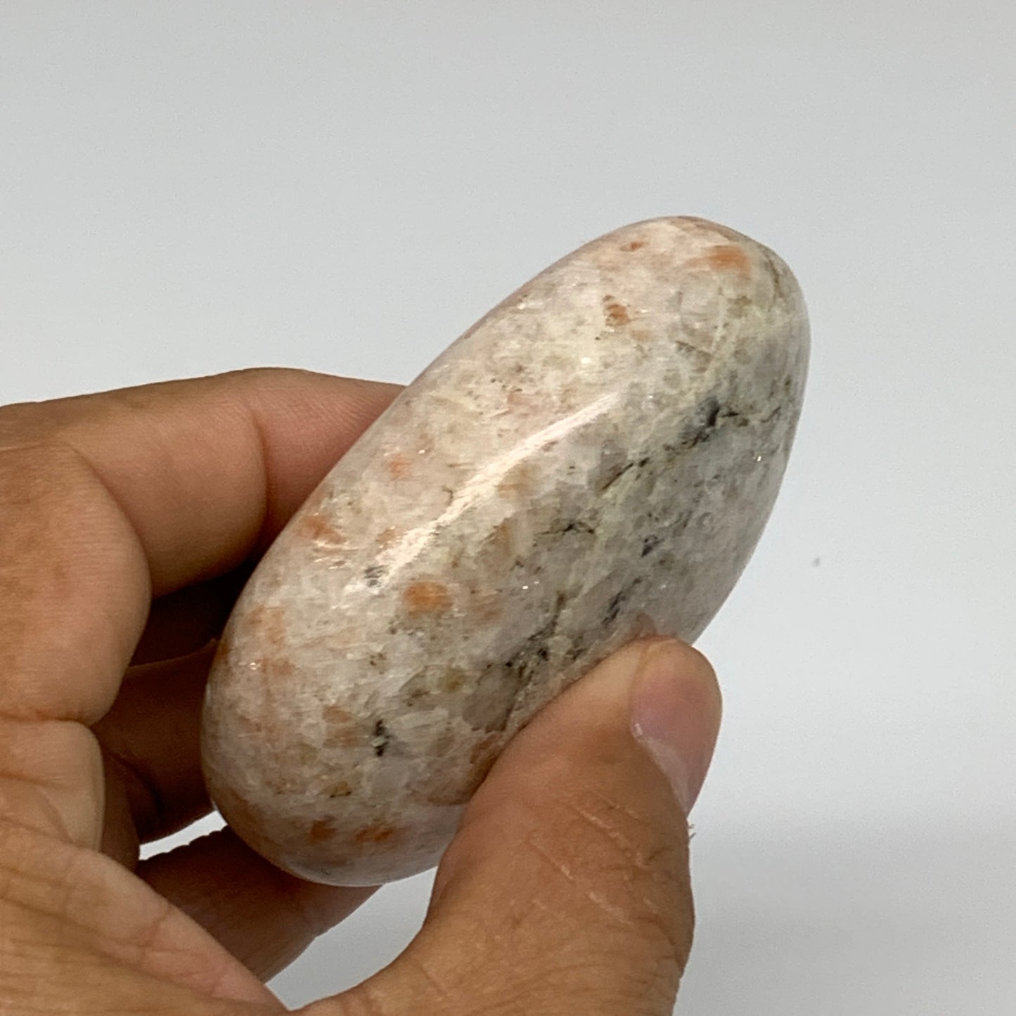 133.7g, 2.7"x2"x0.9", Natural Sunstone Palm-Stone Polished from India, B34783