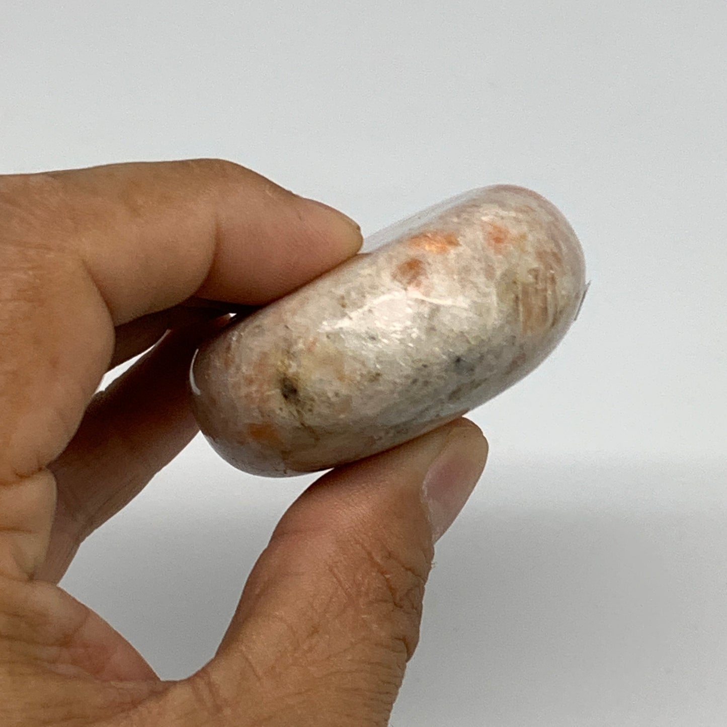 133.7g, 2.7"x2"x0.9", Natural Sunstone Palm-Stone Polished from India, B34783