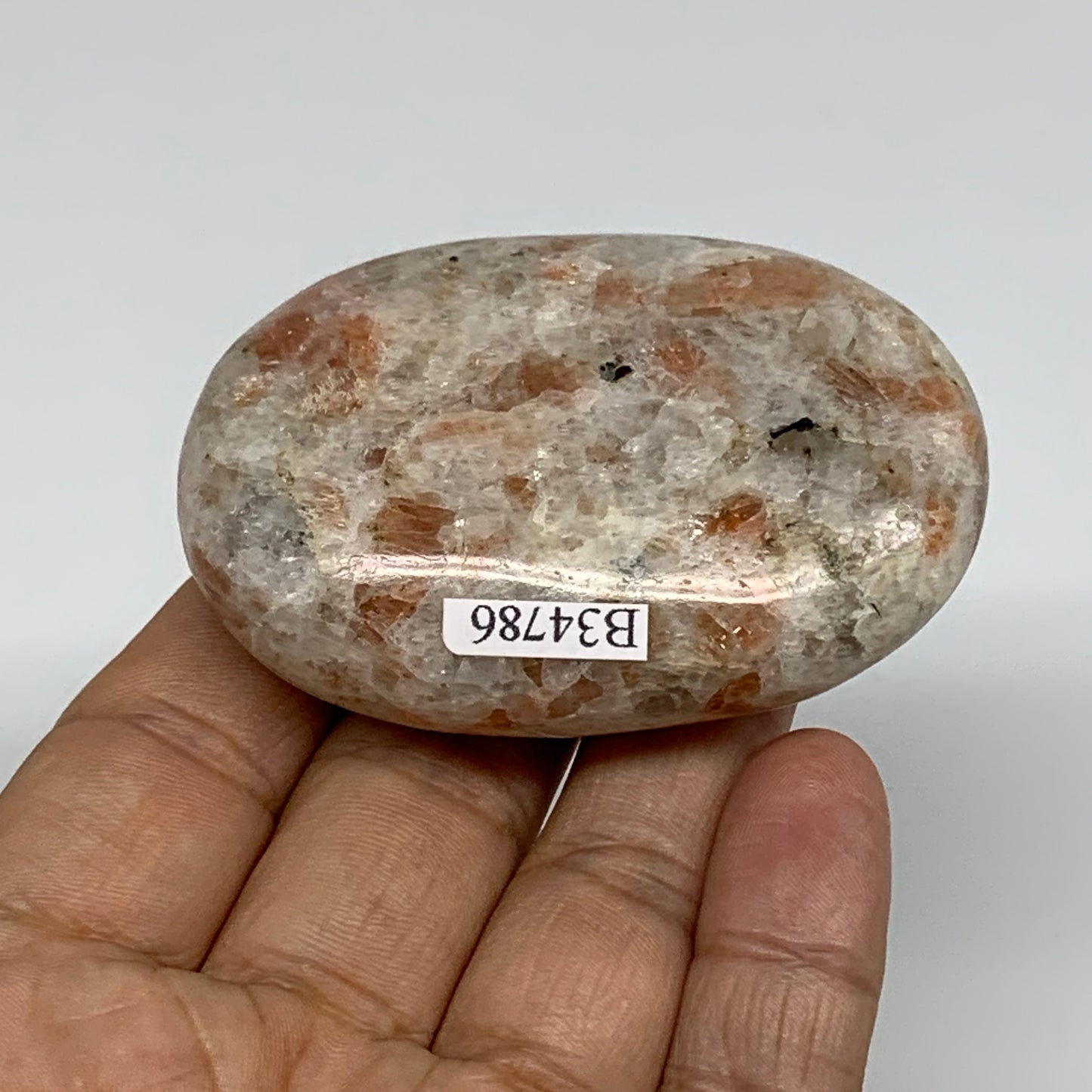 105.2g, 2.6"x1.8"x0.9", Natural Sunstone Palm-Stone Polished from India, B34786