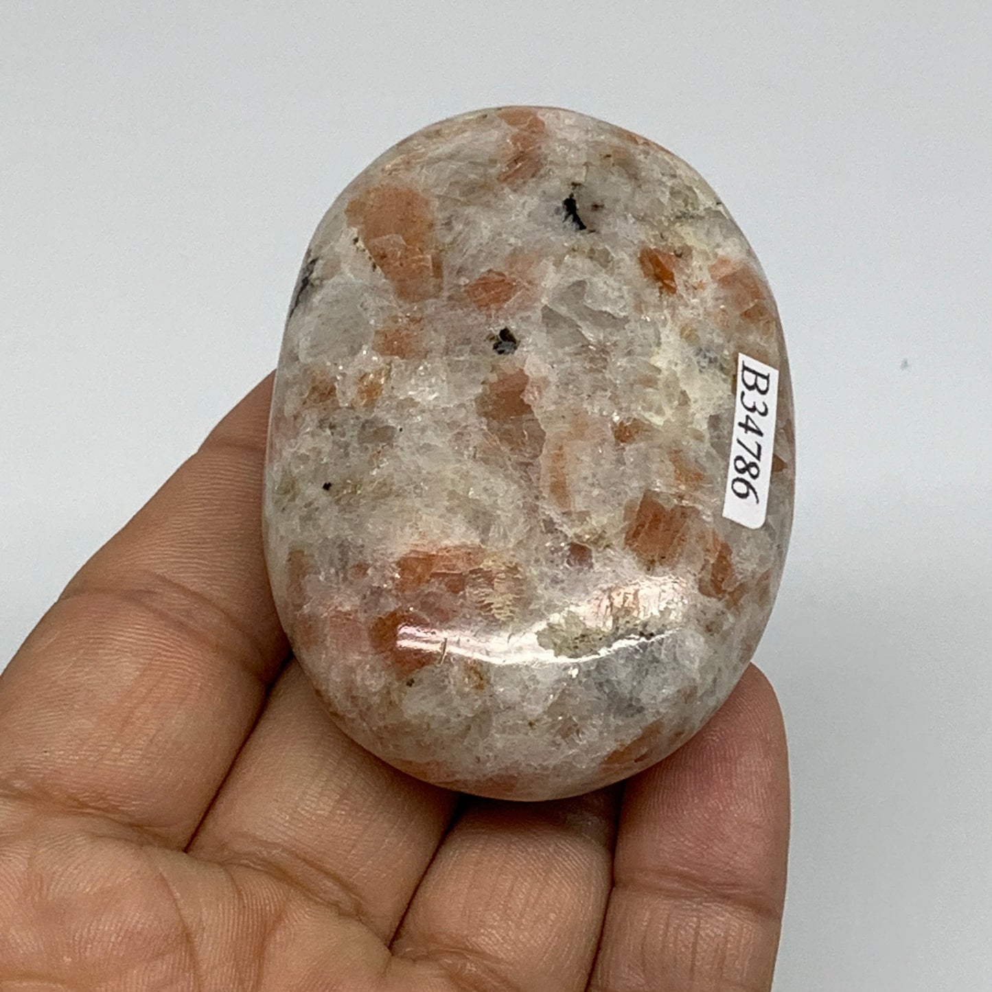 105.2g, 2.6"x1.8"x0.9", Natural Sunstone Palm-Stone Polished from India, B34786