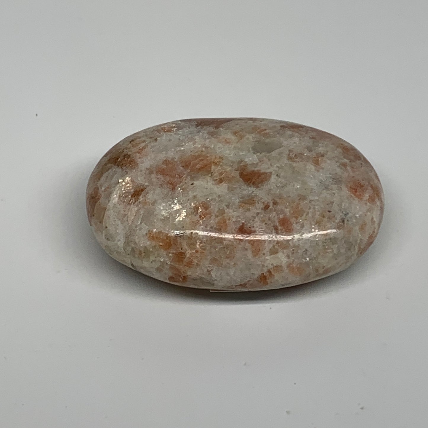 105.2g, 2.6"x1.8"x0.9", Natural Sunstone Palm-Stone Polished from India, B34786