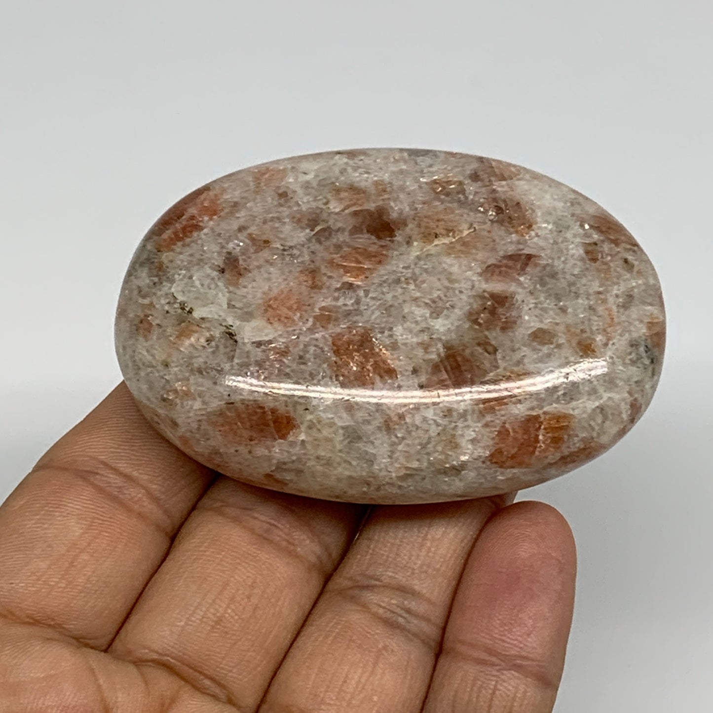 105.3g, 2.6"x1.8"x0.8", Natural Sunstone Palm-Stone Polished from India, B34787