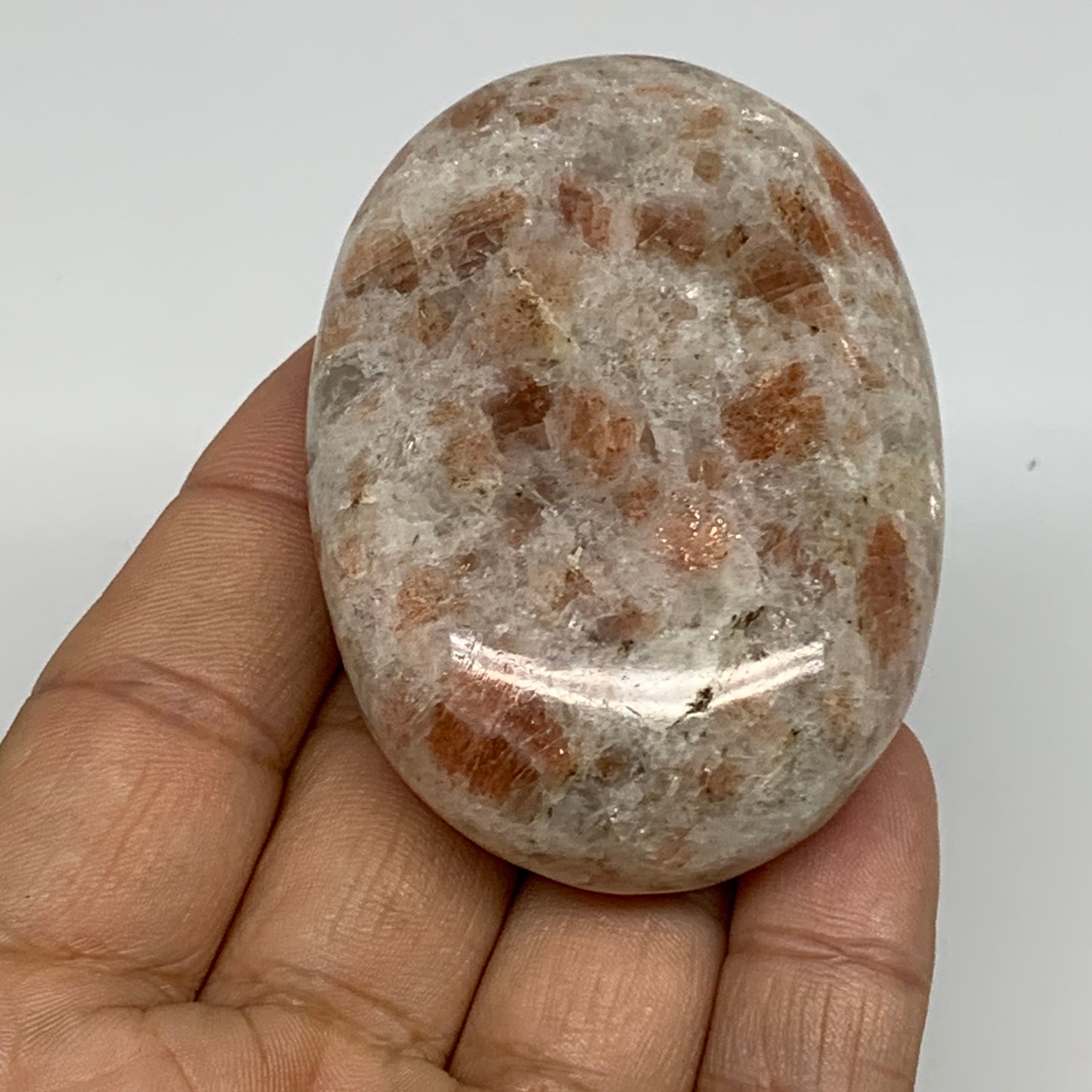 105.3g, 2.6"x1.8"x0.8", Natural Sunstone Palm-Stone Polished from India, B34787