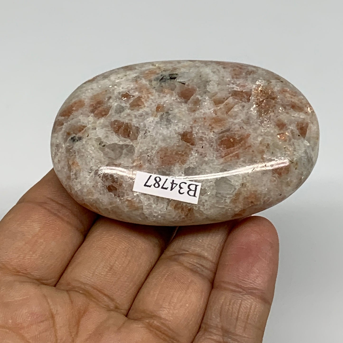 105.3g, 2.6"x1.8"x0.8", Natural Sunstone Palm-Stone Polished from India, B34787
