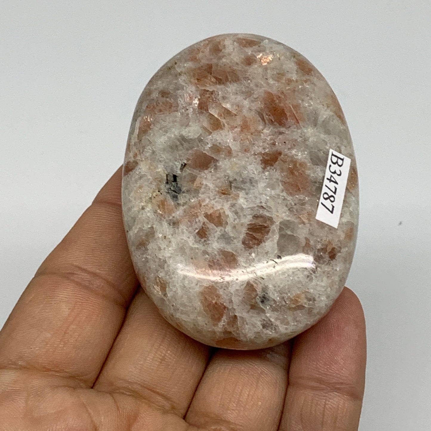 105.3g, 2.6"x1.8"x0.8", Natural Sunstone Palm-Stone Polished from India, B34787