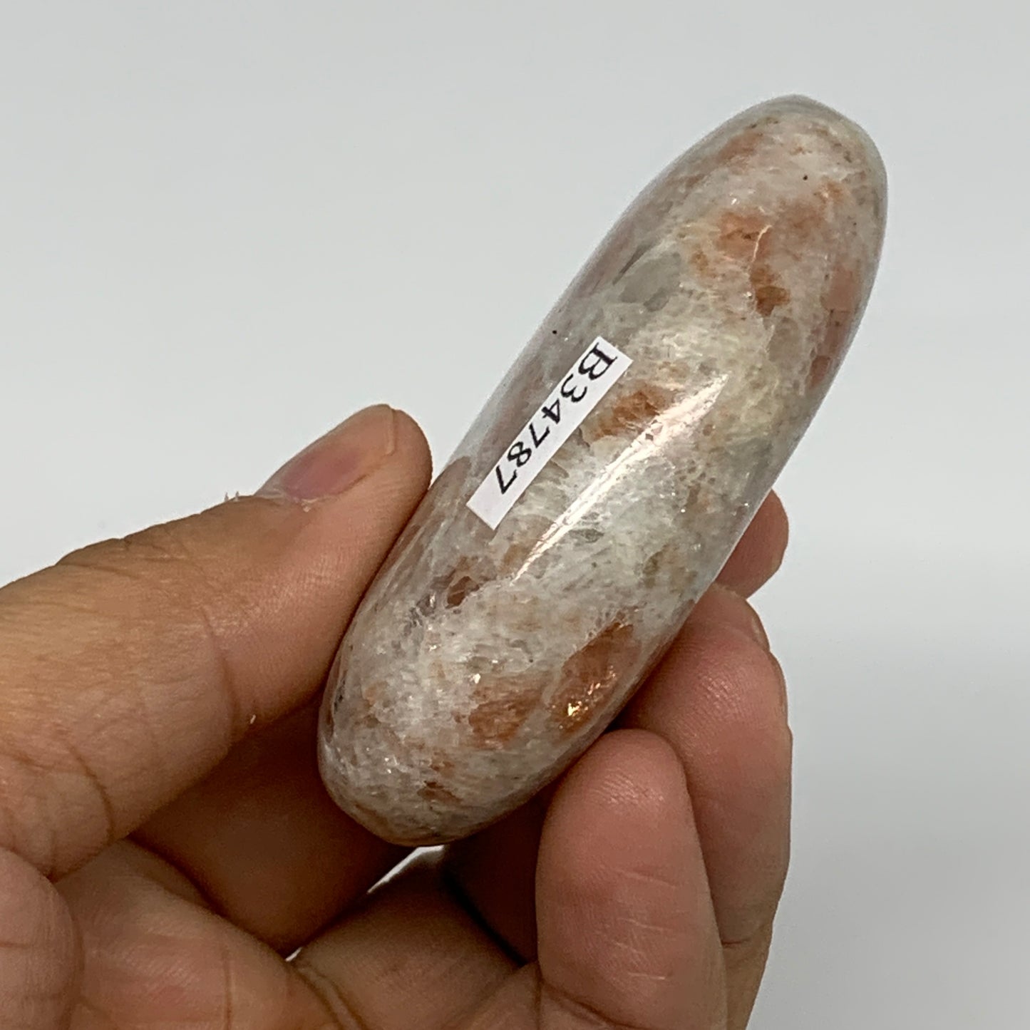 105.3g, 2.6"x1.8"x0.8", Natural Sunstone Palm-Stone Polished from India, B34787