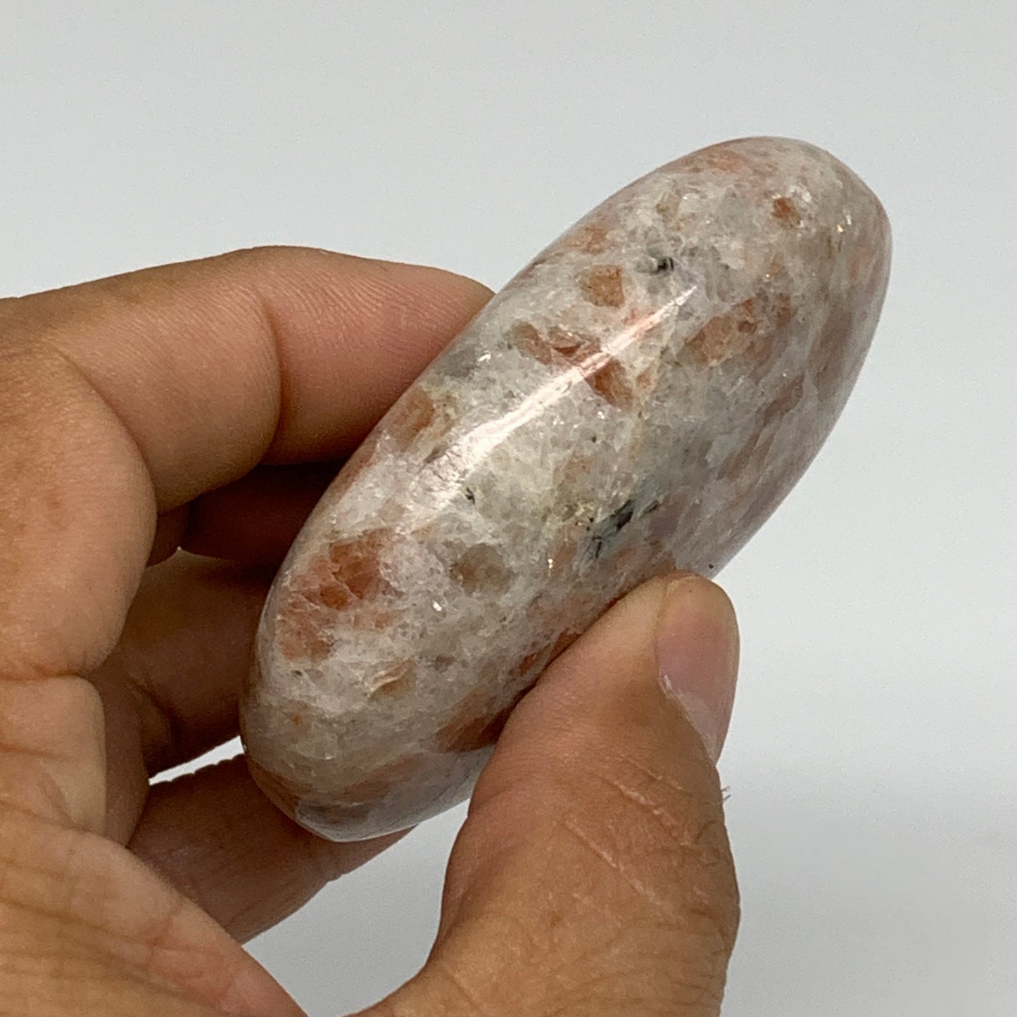 105.3g, 2.6"x1.8"x0.8", Natural Sunstone Palm-Stone Polished from India, B34787