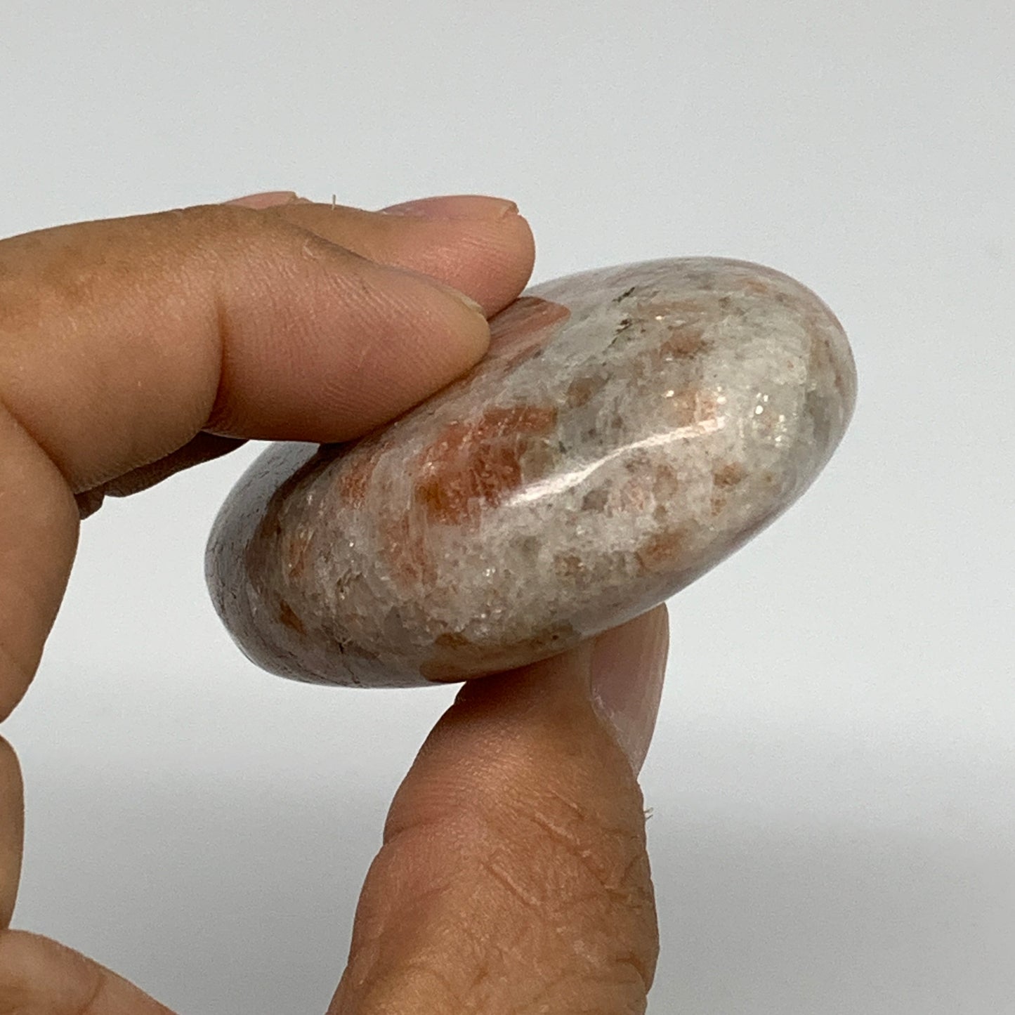 105.3g, 2.6"x1.8"x0.8", Natural Sunstone Palm-Stone Polished from India, B34787