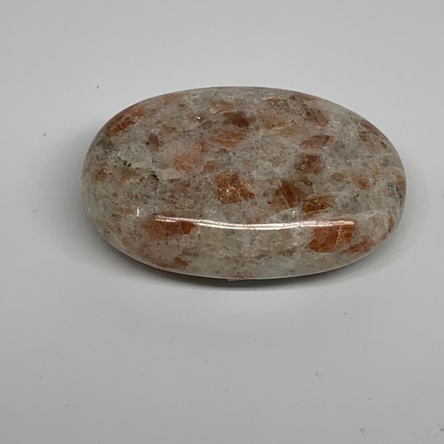 105.3g, 2.6"x1.8"x0.8", Natural Sunstone Palm-Stone Polished from India, B34787